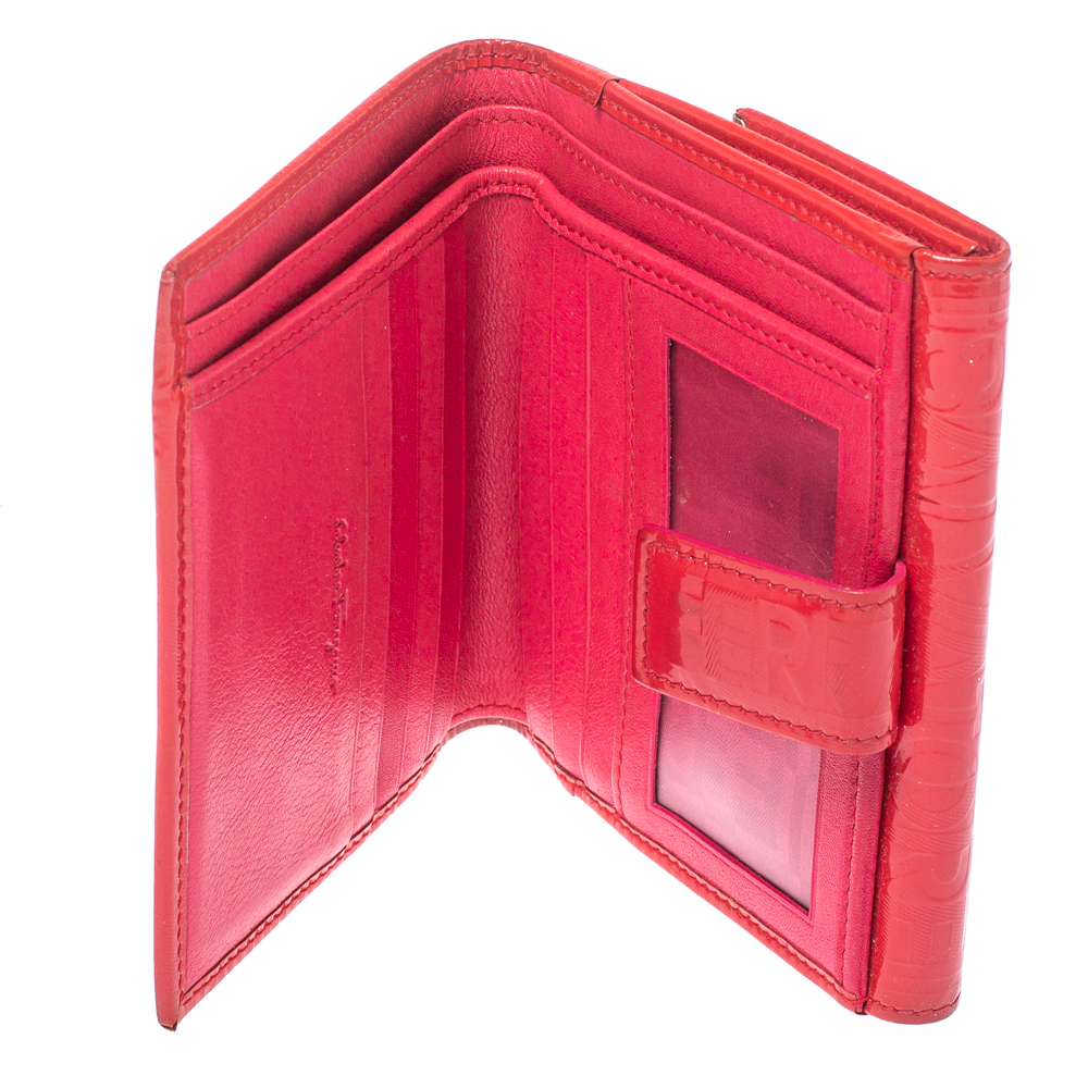 

Salvatore Ferragamo Pink Monogram Embossed Patent Leather Gancini Triifold Wallet