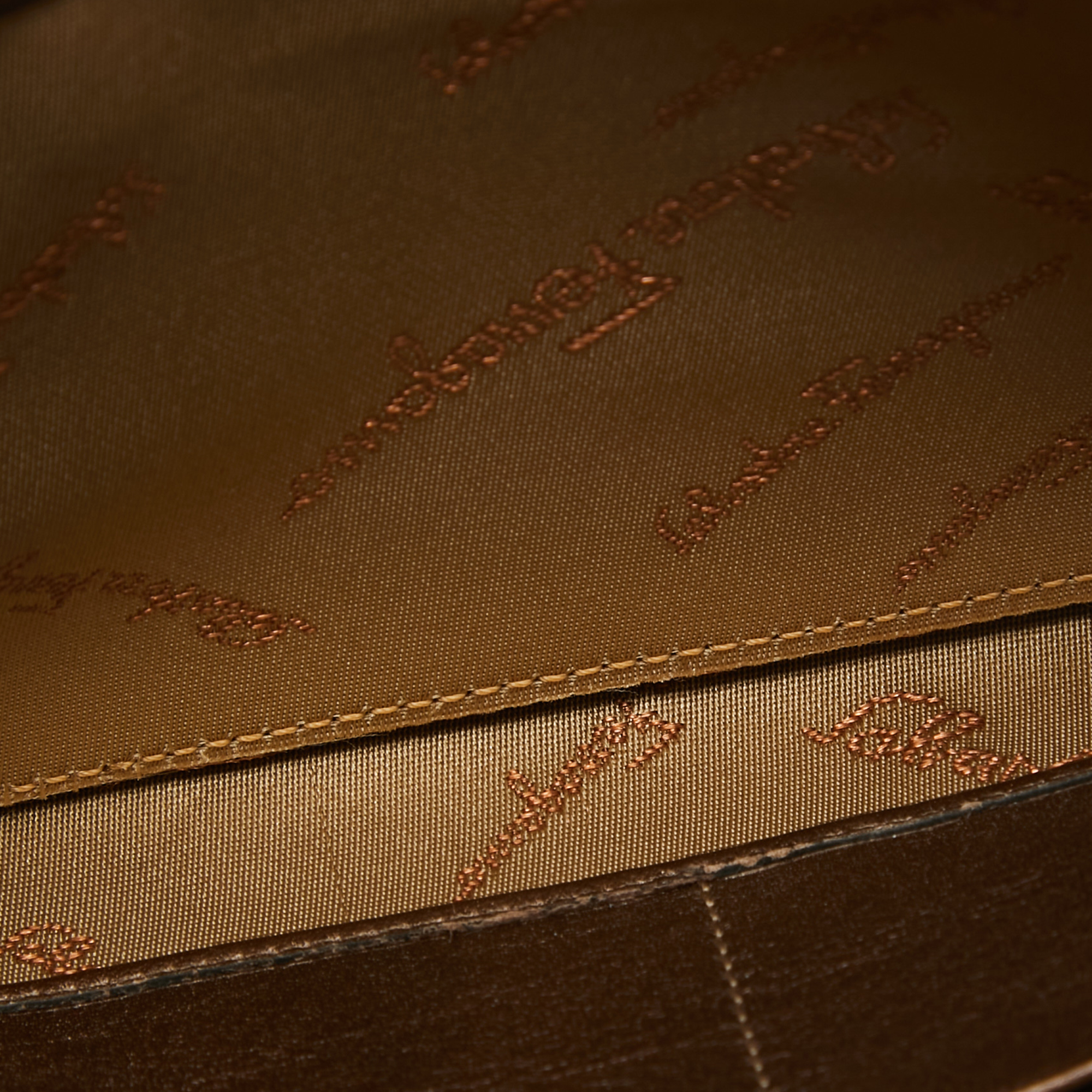 

Salvatore Ferragamo Metallic Brown Leather Gancini Clasp Continental Wallet