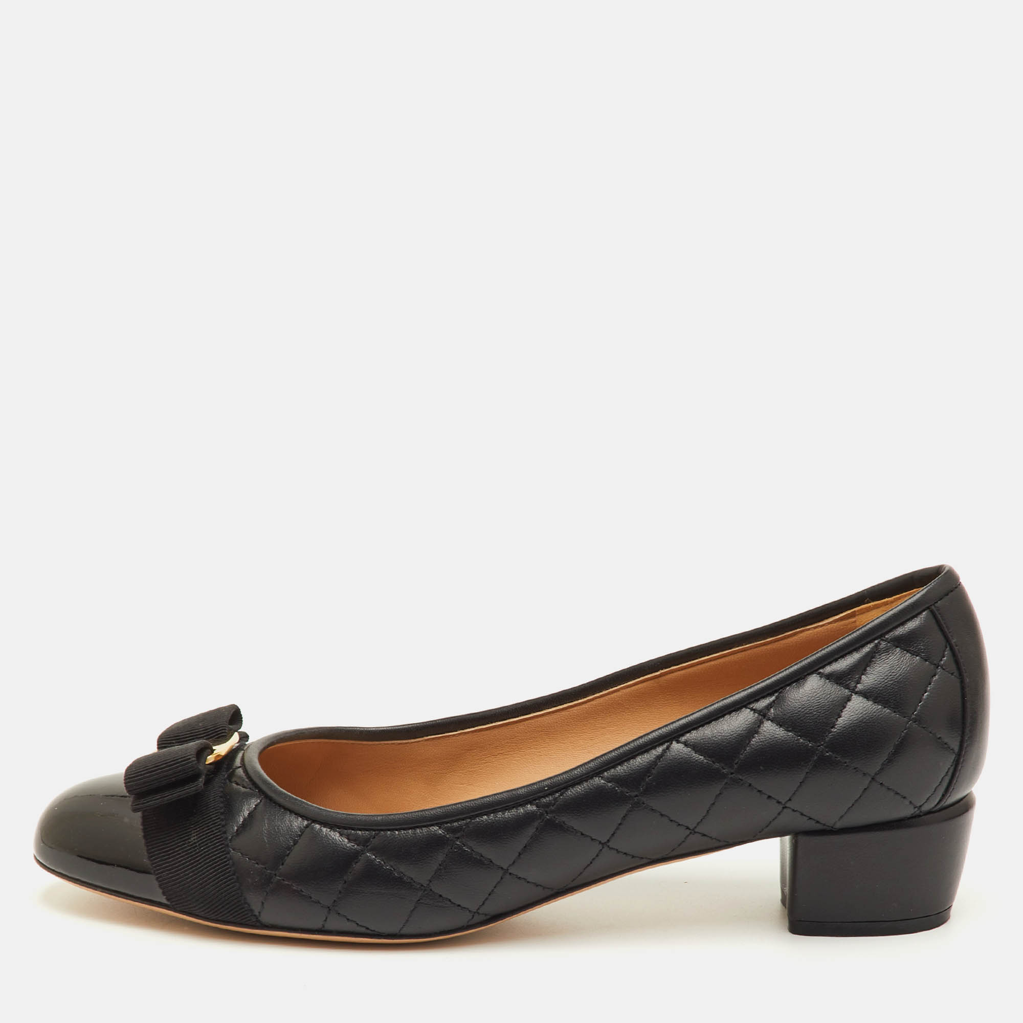 

Salvatore Ferragamo Vara Bow Size 41 Black Quilted Leather and Patent Cap Toe Pumps