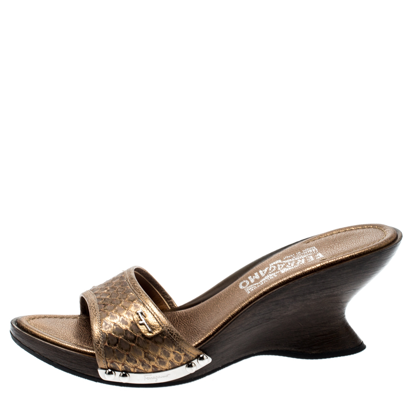 

Salvatore Ferragamo Metallic Gold Python Leather Open Toe Wedge Slides Size