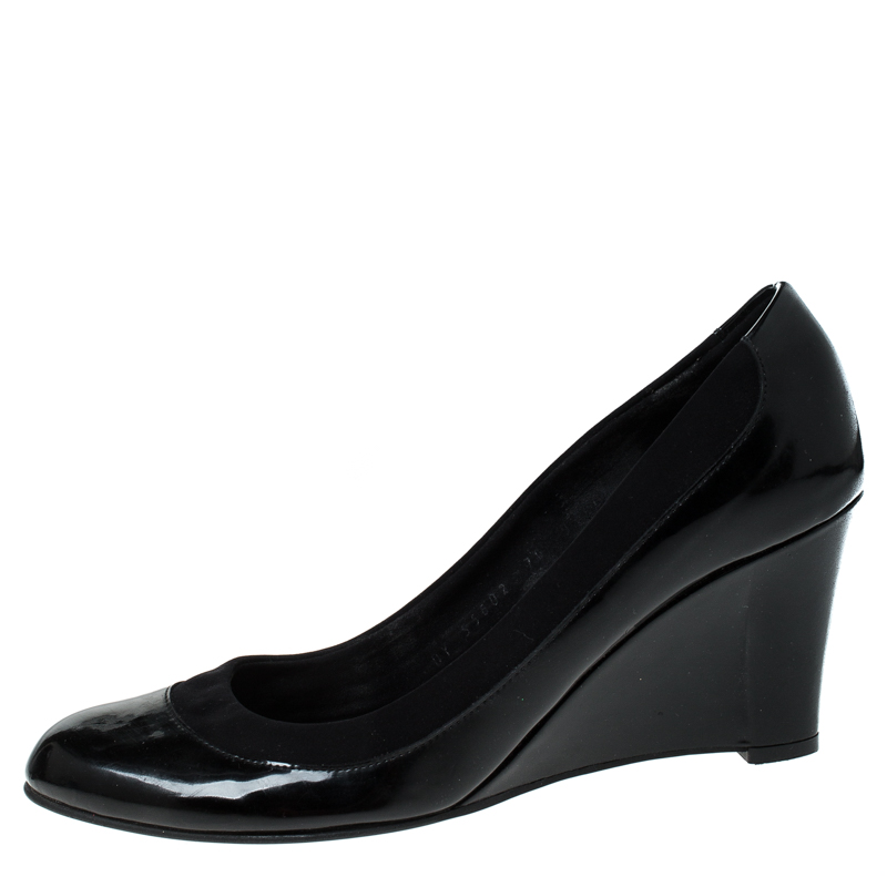 

Salvatore Ferragamo Black Patent Leather Wedge Pumps Size
