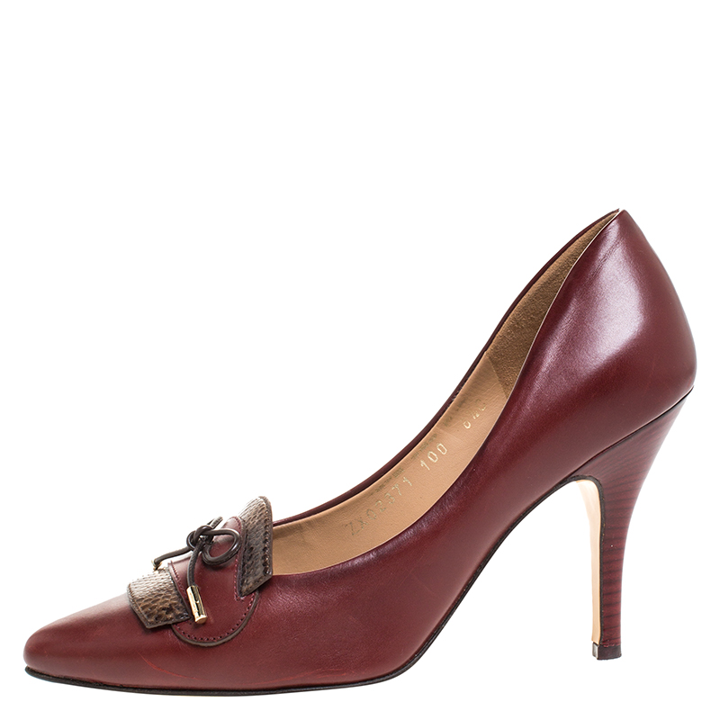 

Salvatore Ferragamo Burgundy Leather and Python Trim Bow Pumps Size