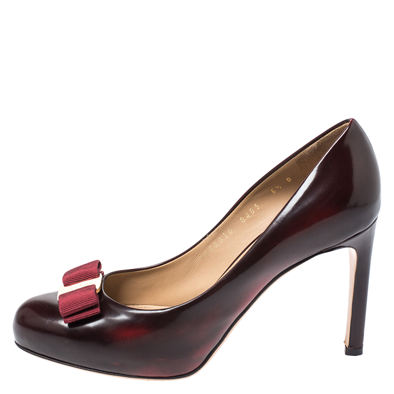 

Salvatore Ferragamo Burgundy Leather Vara Bow Platform Pumps Size