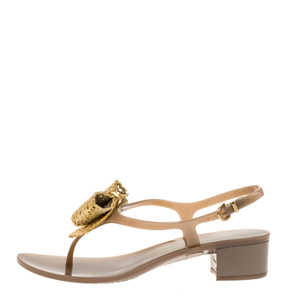 

Salvatore Ferragamo Beige/Gold Jelly Perala Bow Thong Sandals Size