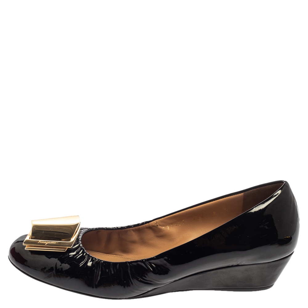 

Salvatore Ferragamo Black Patent Leather Tilda Wedge Pumps Size