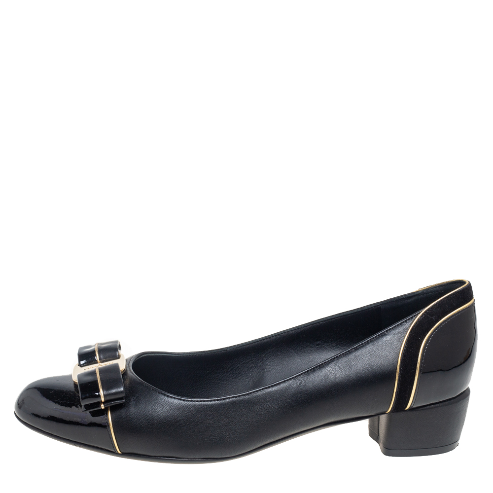 

Salvatore Ferragamo Black Leather and Patent Leather Vara Bow Pumps Size