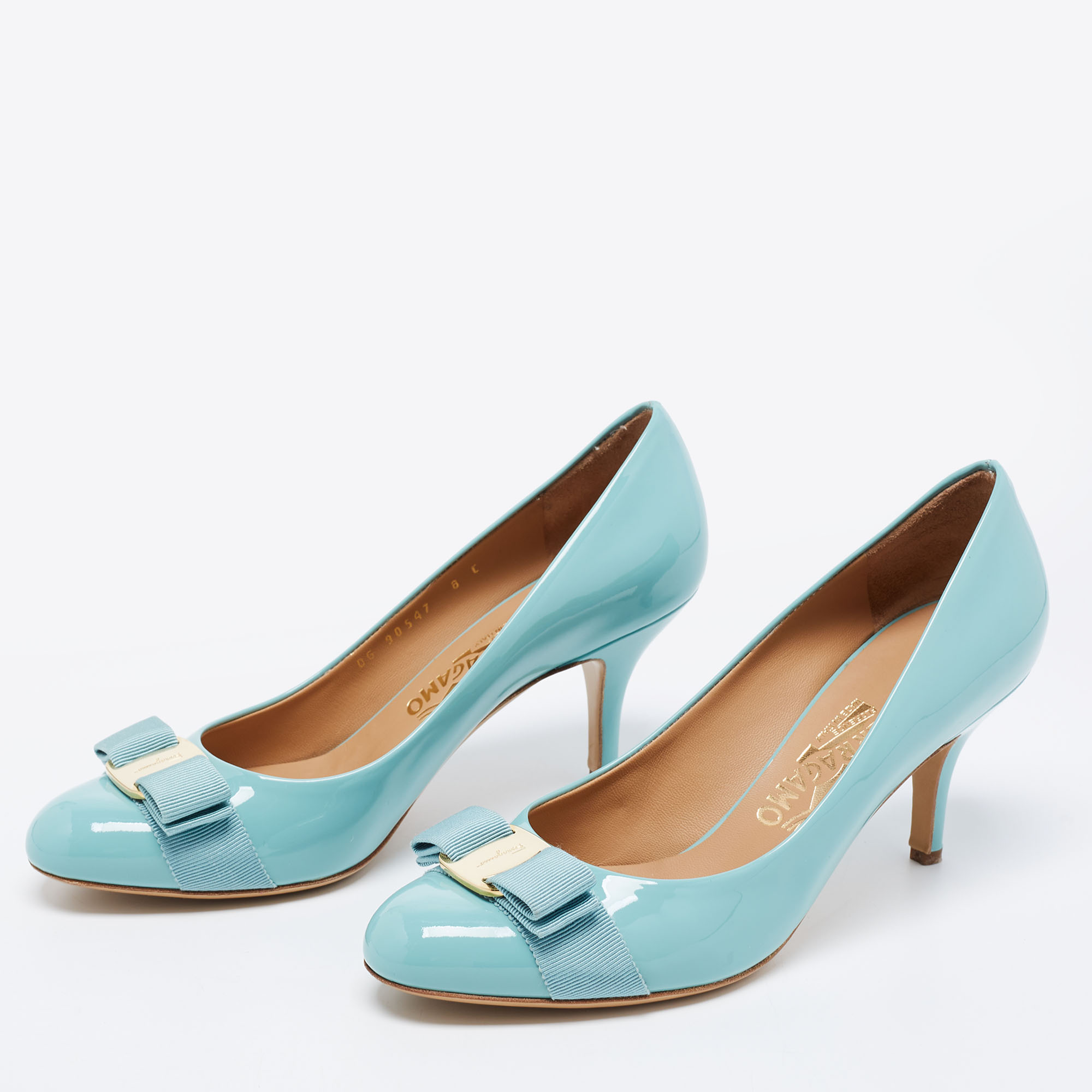 

Salvatore Ferragamo Turquoise Patent Leather Vara Bow Pumps Size, Blue