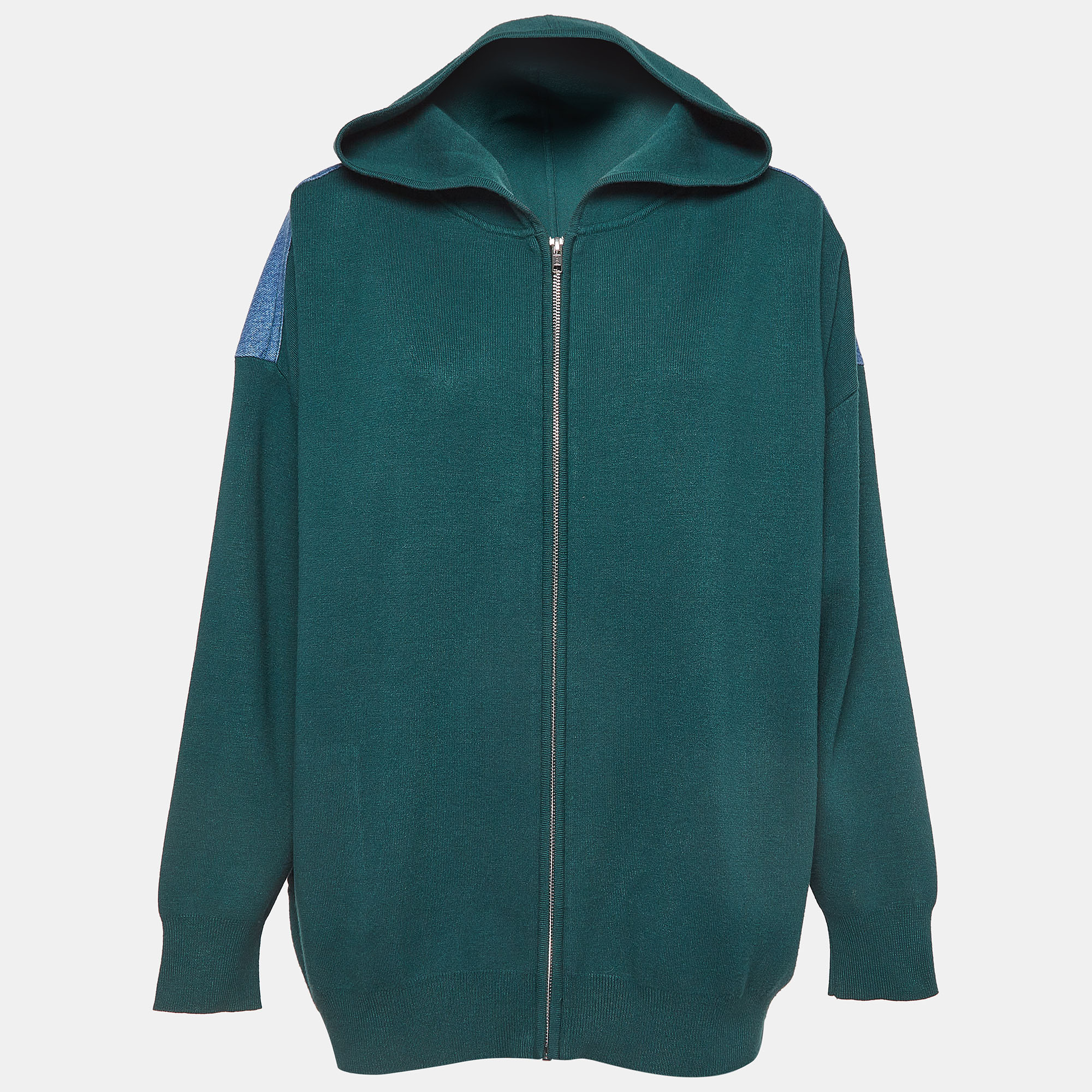 Introducing the Sandro hoodie-a fusion of comfort and style. Crafted with precision this hoodie boasts a cozy knit fabric blended seamlessly with denim accents. Its oversized silhouette exudes effortless coolness while the rich green hue adds a pop of personality to any ensemble.