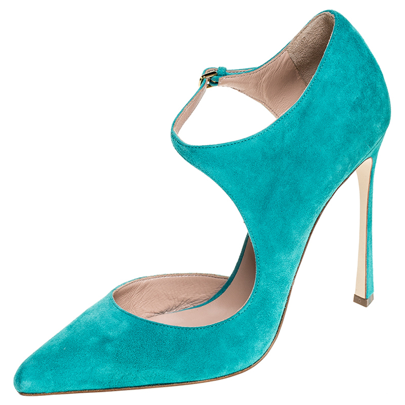 A chic pair of pumps from Sergio Rossi that offers an upgrade to your style. Feel beautiful and be comfortable while flaunting these suede pumps in aqua blue. They feature pointed toes ankle straps leather insoles and 12 cm heels.