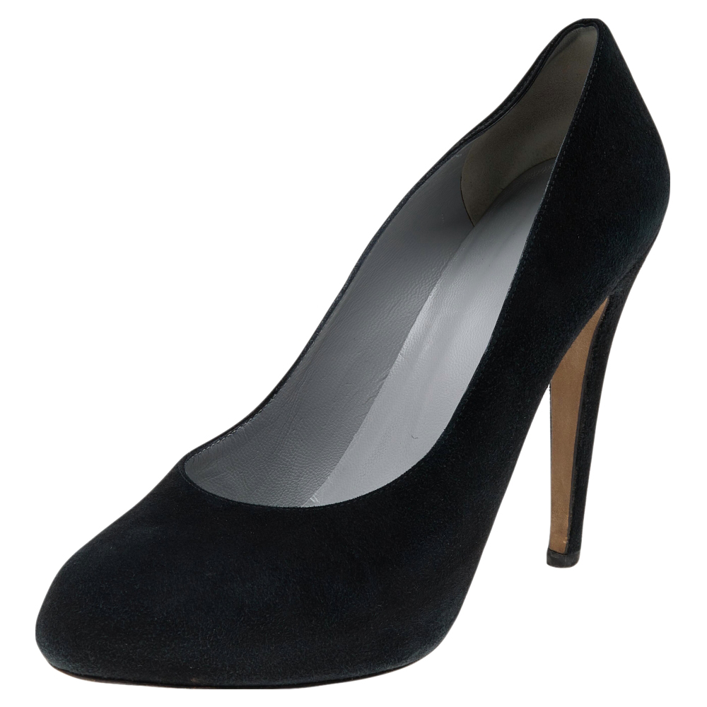 There are some shoes that stand the test of time and fashion cycles these timeless Sergio Rossi pumps are the one. Crafted from suede in a black shade they are designed with sleek cuts round toes and tall heels.