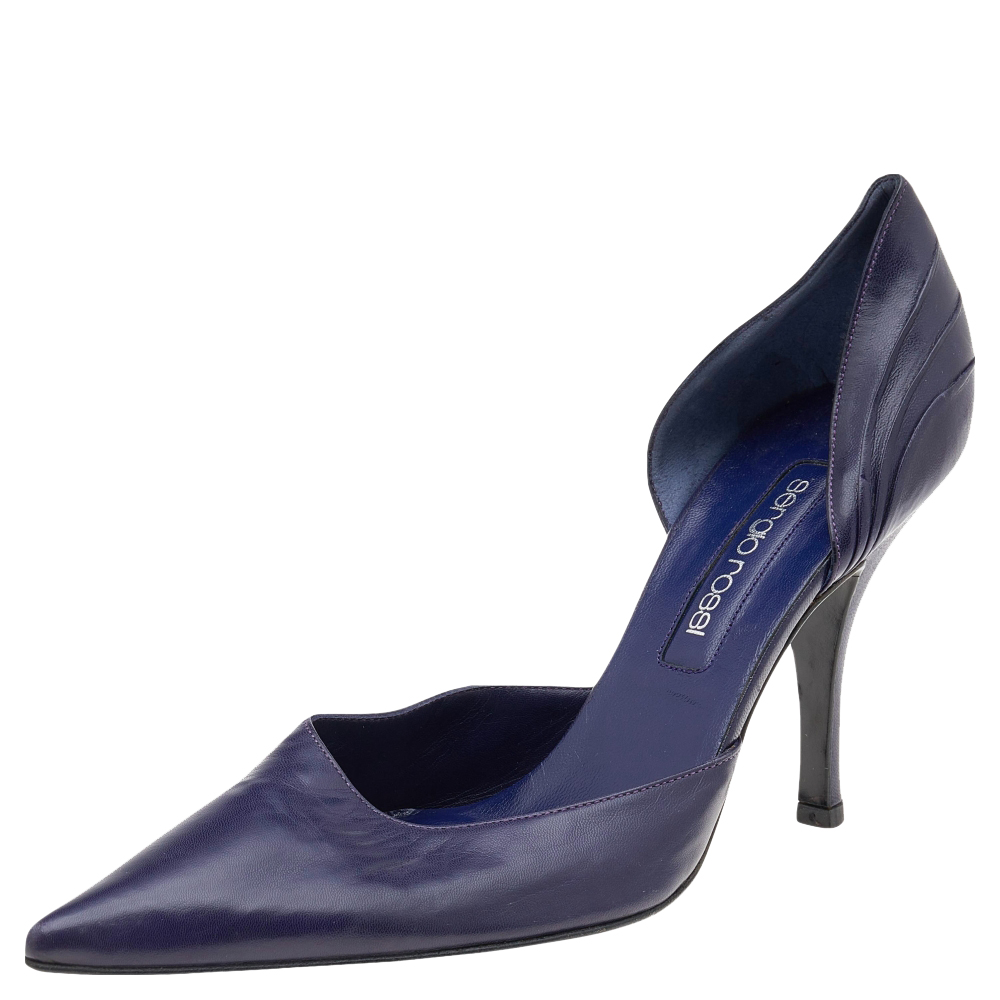 There are some shoes that stand the test of time and fashion cycles these timeless Sergio Rossi pumps are the one. Crafted from leather in a purple shade they are designed with sleek cuts pointed toes and tall heels.