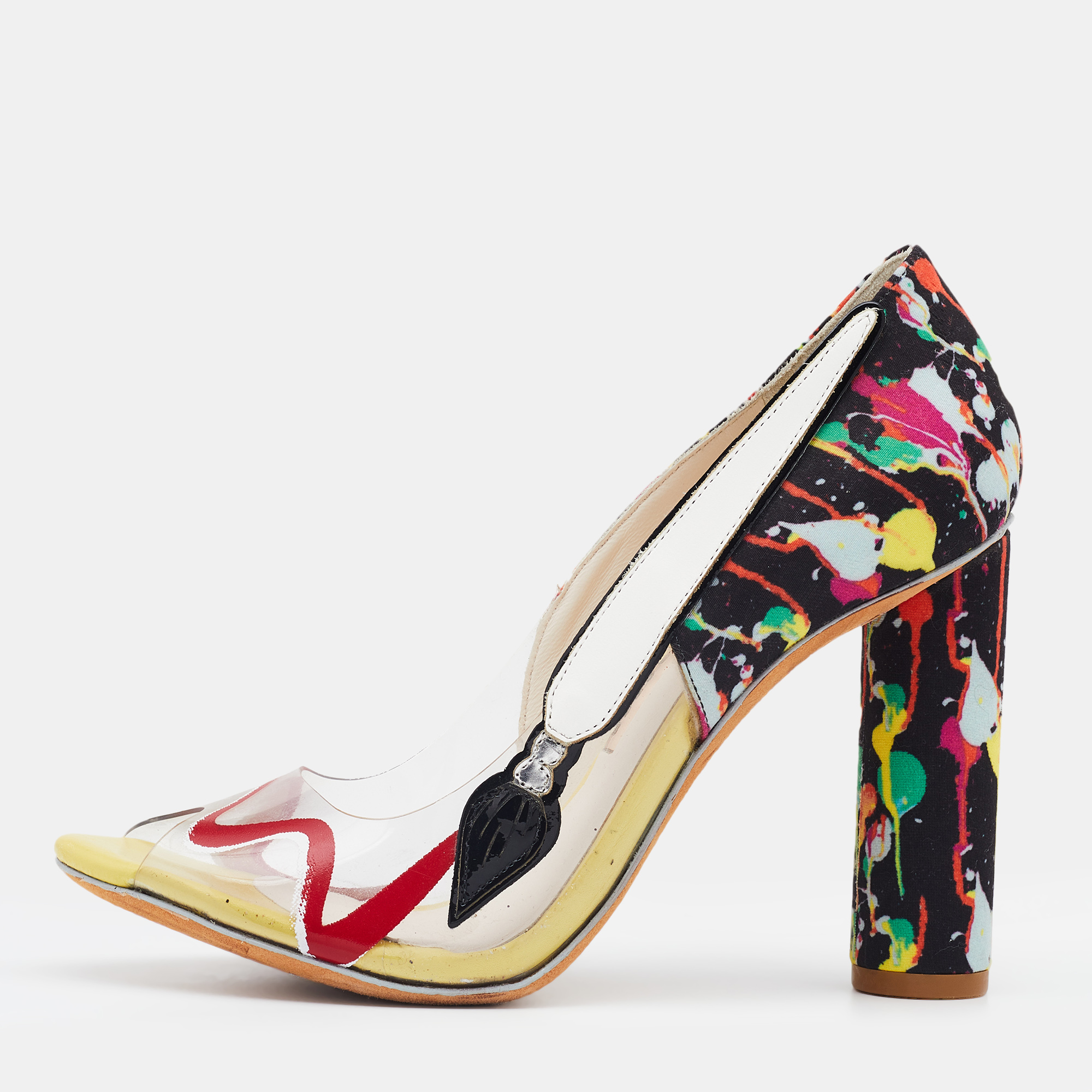 Sophisticated and elegant these Party Like Pollock pumps from Sophia Webster are all about high fashion and style. Crafted from multicolored PVC and fabric on the exterior these pumps showcase 10 cm heels peep toes and a slip on style. Look your stylish best as you pair these pretty pumps with your outfit.