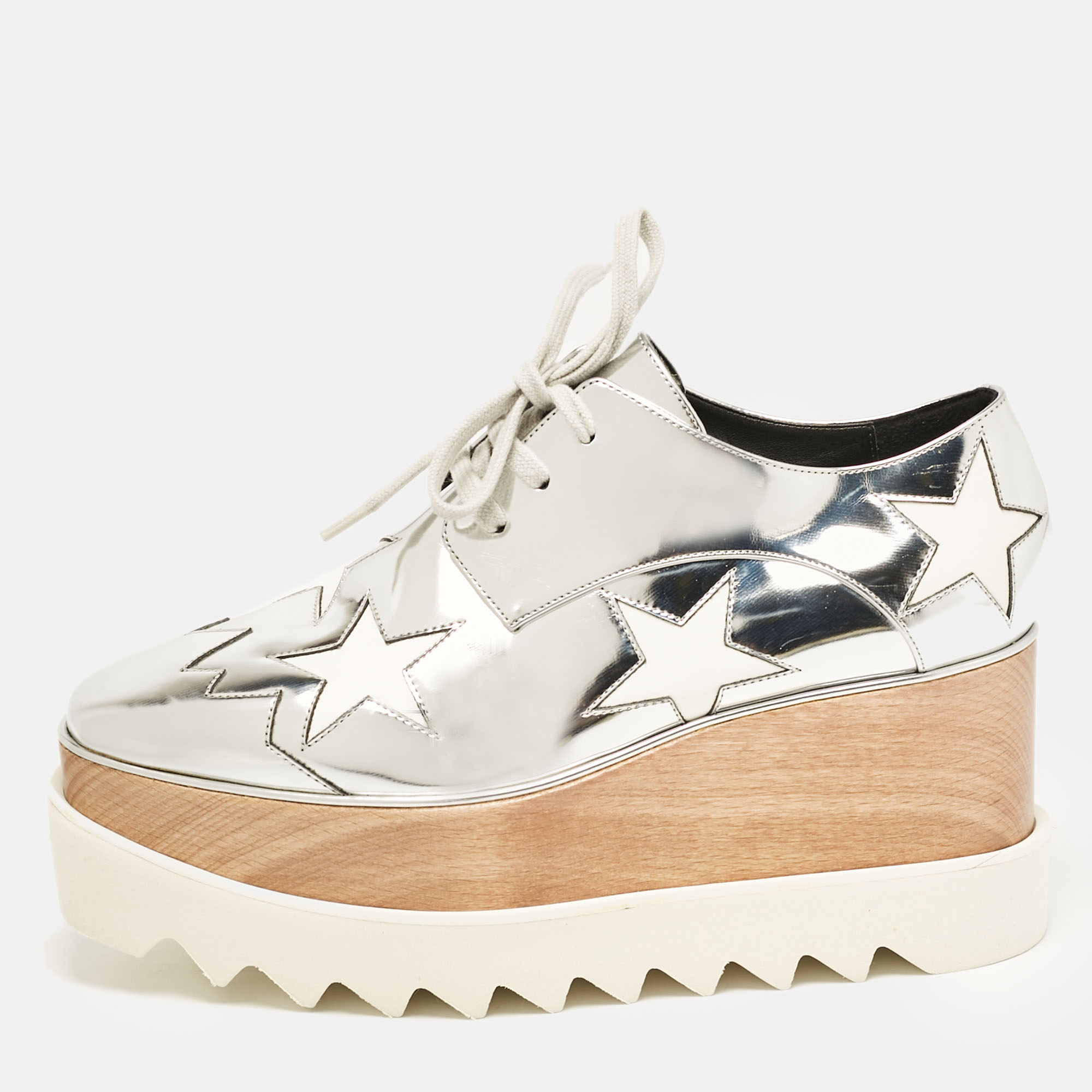 

Stella McCartney Silver Faux Leather Elyse Star Platform Sneakers Size