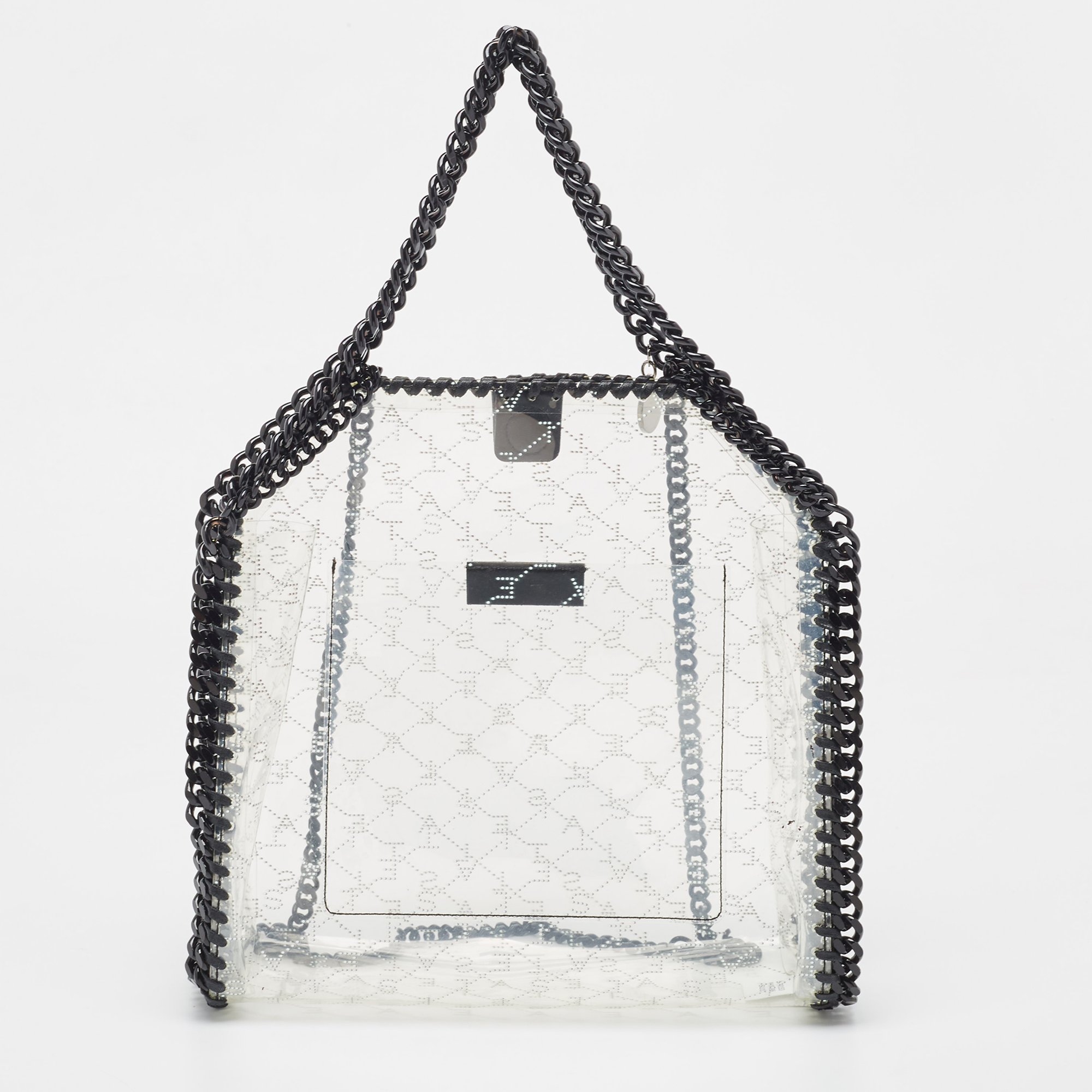 The chain whipstitch detailing beautifully outlines this Stella Mc Cartney Falabella tote. Crafted from PVC it has been adorned with black tone accents and it can be carried with dual chain handles. The lined interior can safely store your essentials neatly.