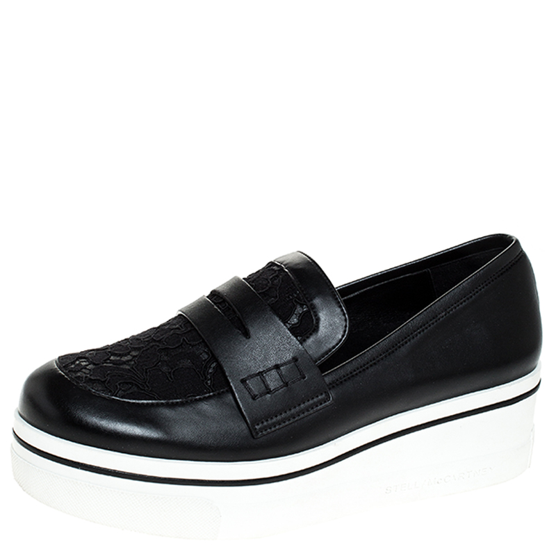black faux leather slip on sneakers
