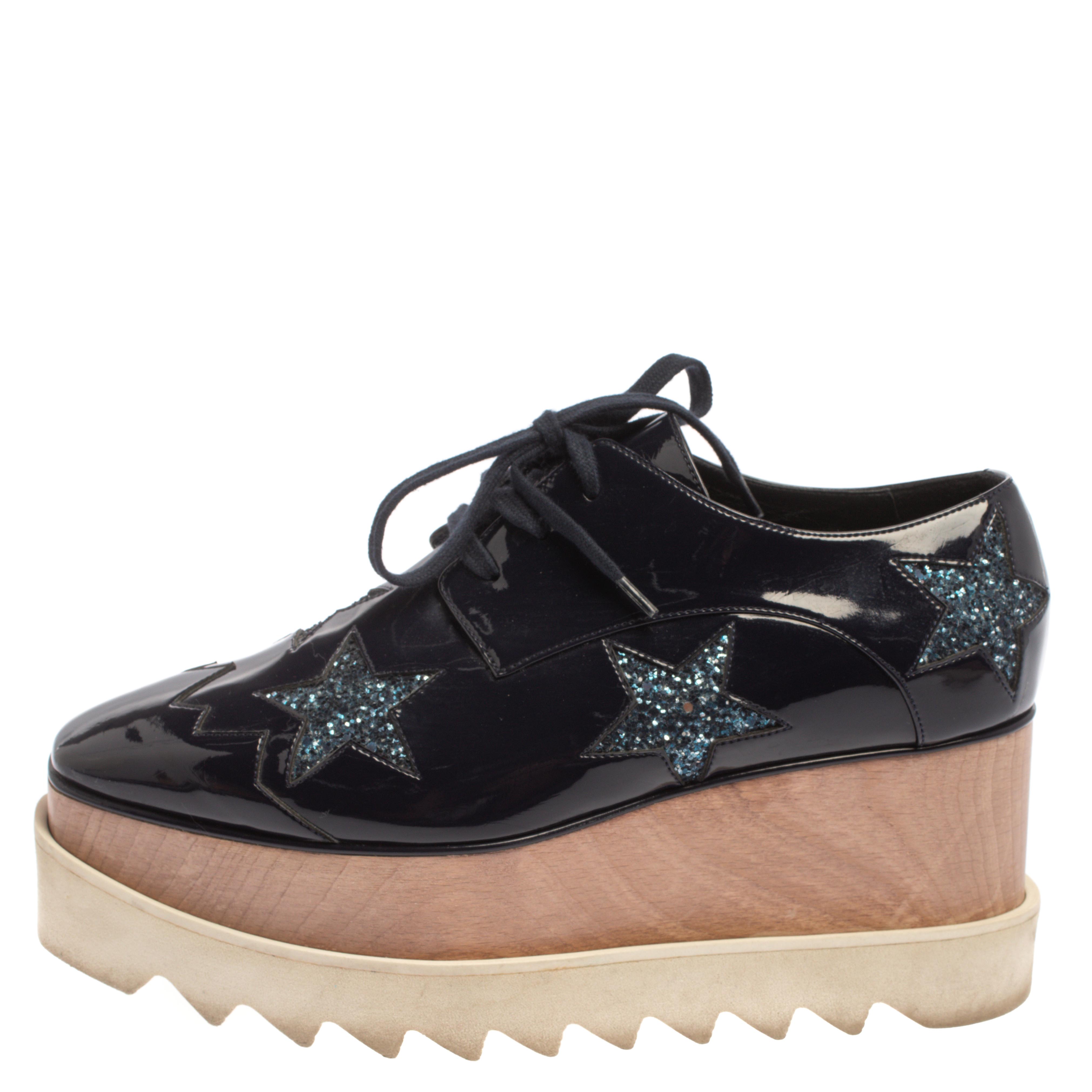 

Stella McCartney Blue Faux Patent Leather And Glitter Elyse Star Platform Derby Sneakers Size