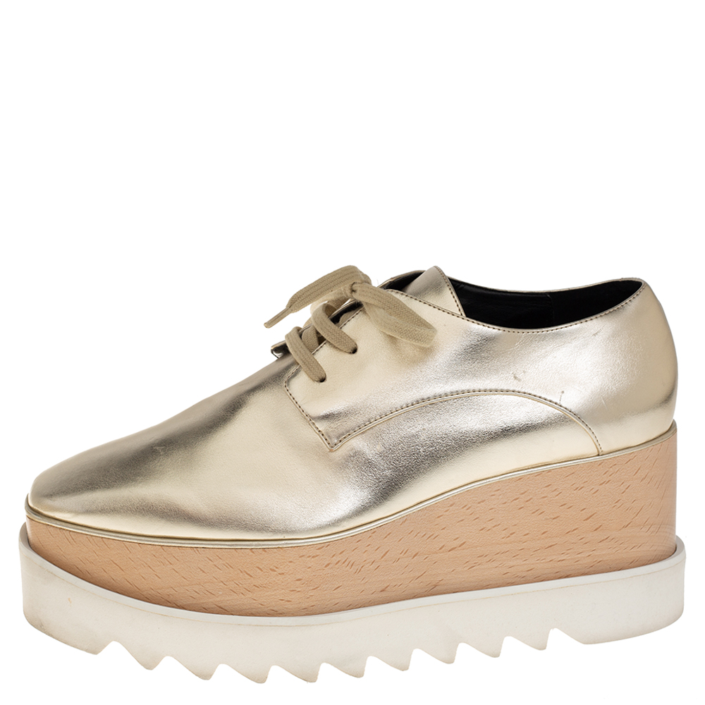 

Stella McCartney Gold Faux Leather Wedge Sneakers Size