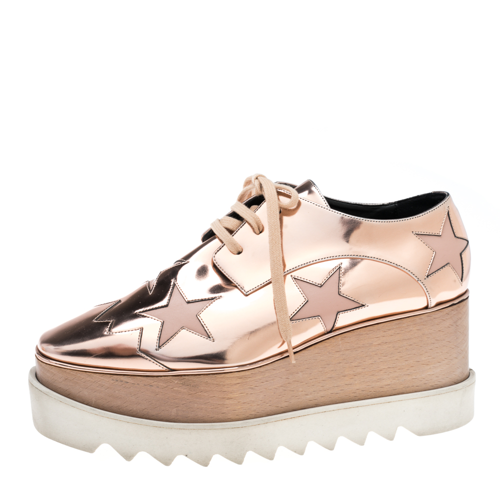 

Stella McCartney Gold Faux Leather Elyse Platform Sneakers Size