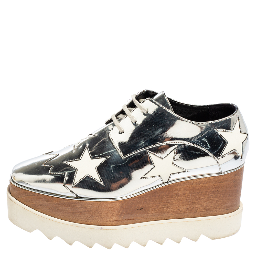 

Stella McCartney Silver Faux Patent and Leather Elyse Star Platform Lace Up Sneakers Size