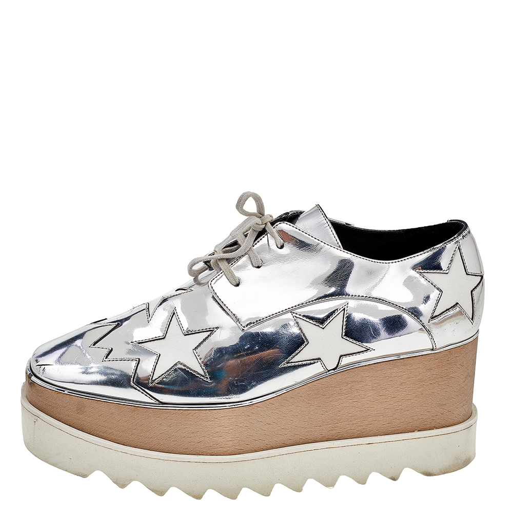 

Stella McCartney Silver/White Faux Patent And Leather Elyse Star Platform Lace Up Sneakers Size