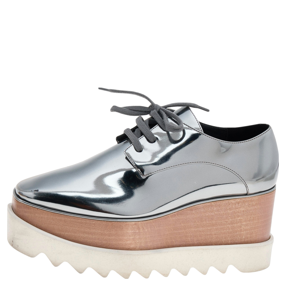 

Stella McCartney Metallic Grey Faux Patent Leather Elyse Platform Sneakers Size