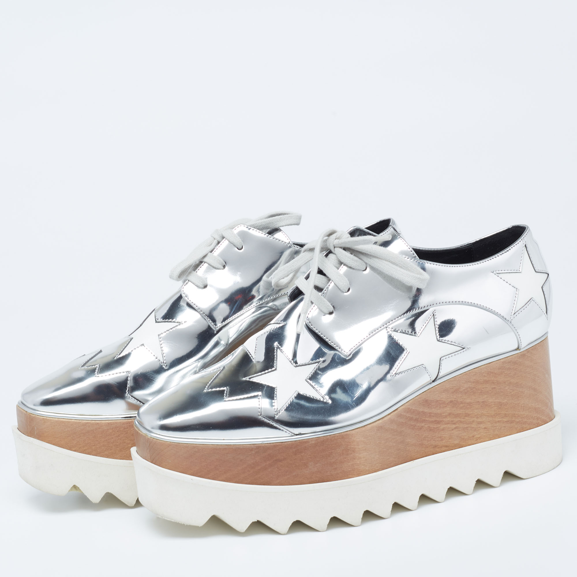 

Stella McCartney Silver Faux Leather Elyse Star Sneakers Size