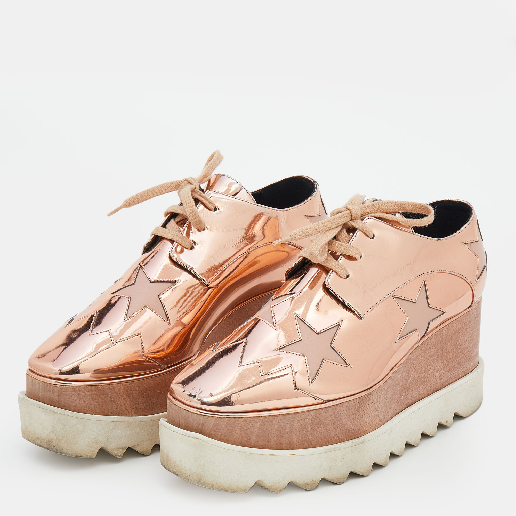 

Stella McCartney Metallic Rose Gold Faux Patent Leather Elyse Star Platform Lace Up Sneakers Size
