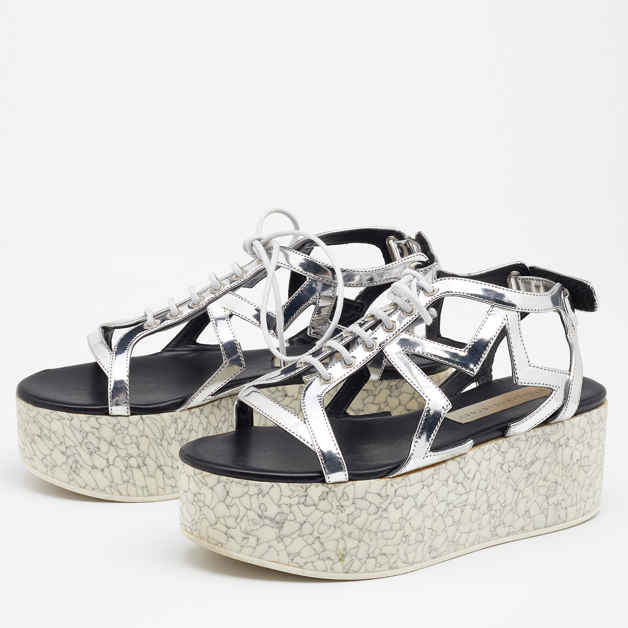 

Stella McCartney Metallic Silver Cut Out Faux Leather Hackney Printed Wedge Platform Sandals Size