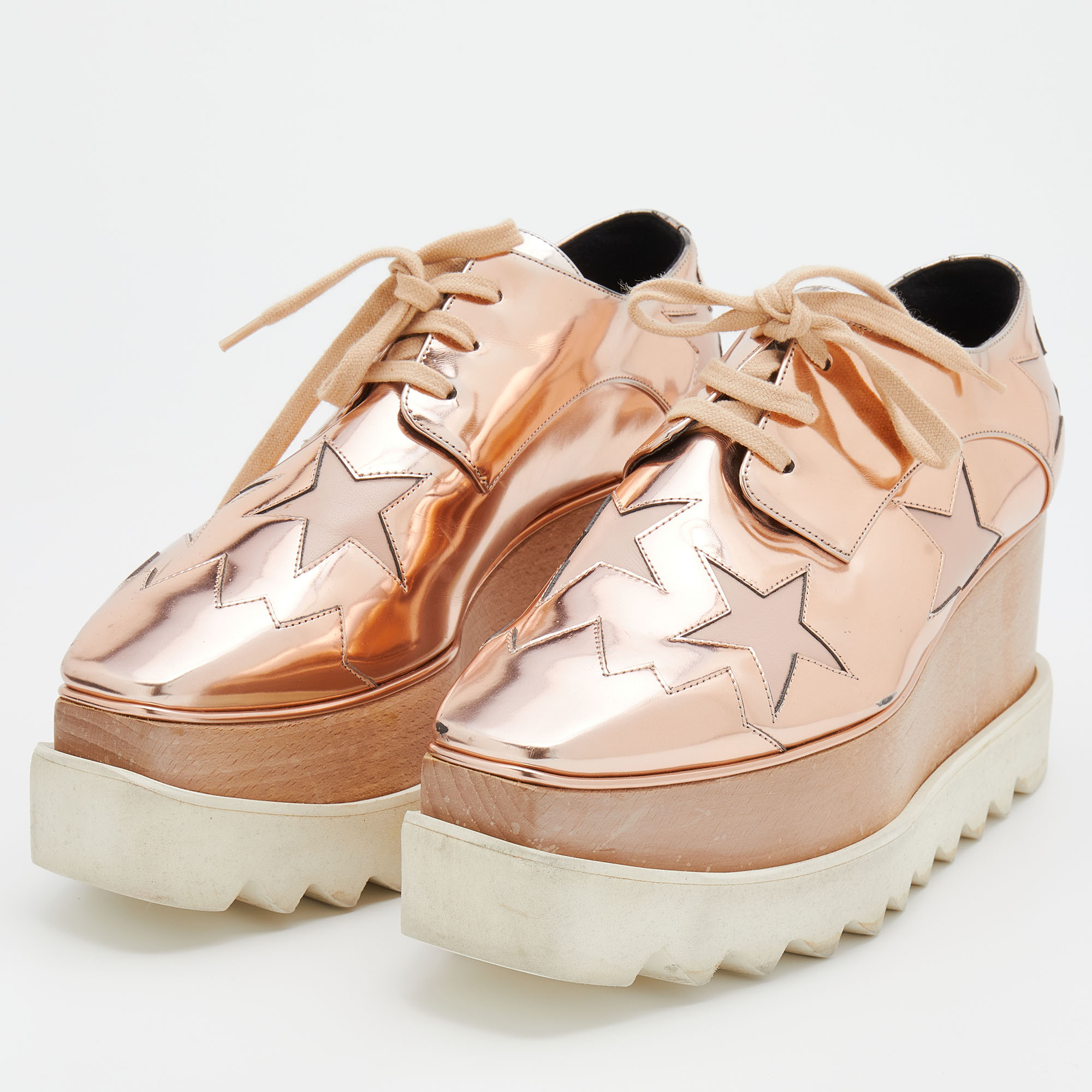 

Stella McCartney Metallic Rose Gold Faux Patent and Leather Elyse Star Platform Sneakers Size