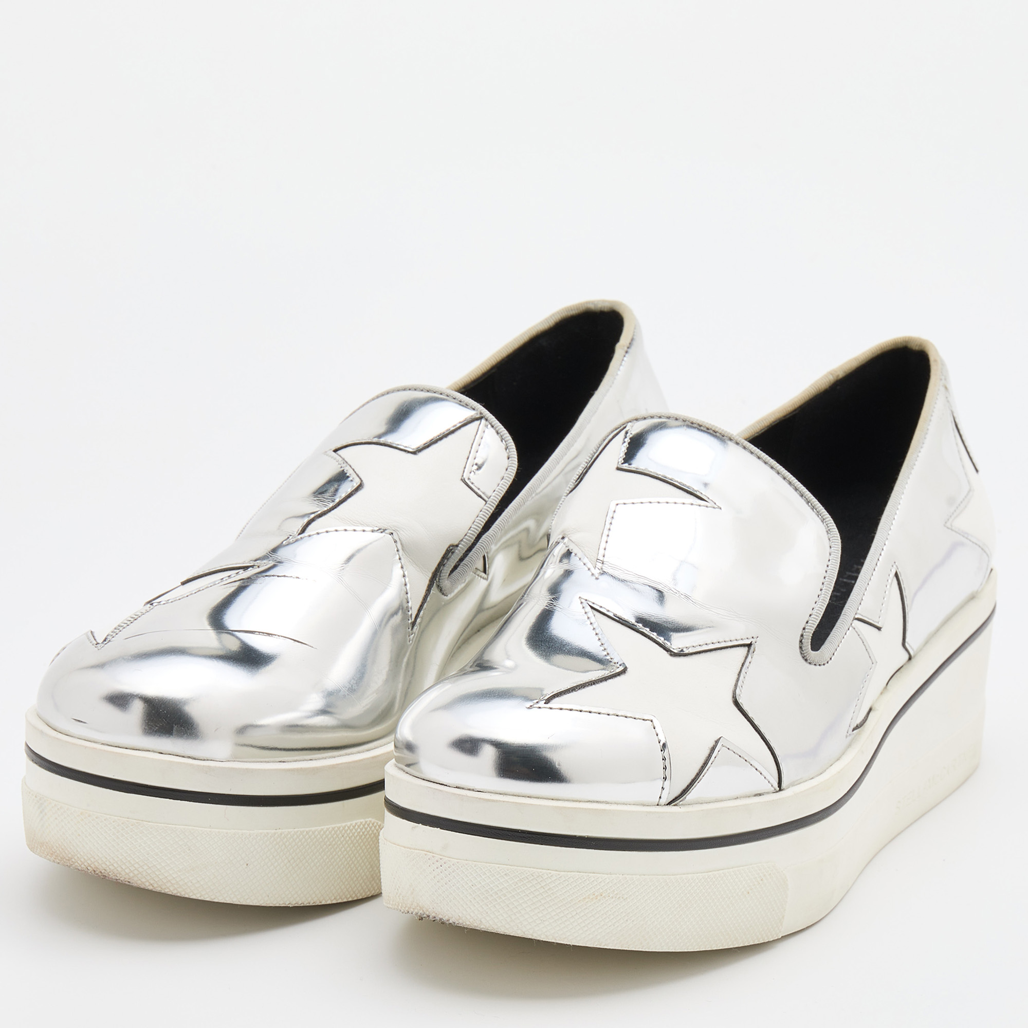

Stella McCartney Silver Faux Leather Binx Star Sneakers Size