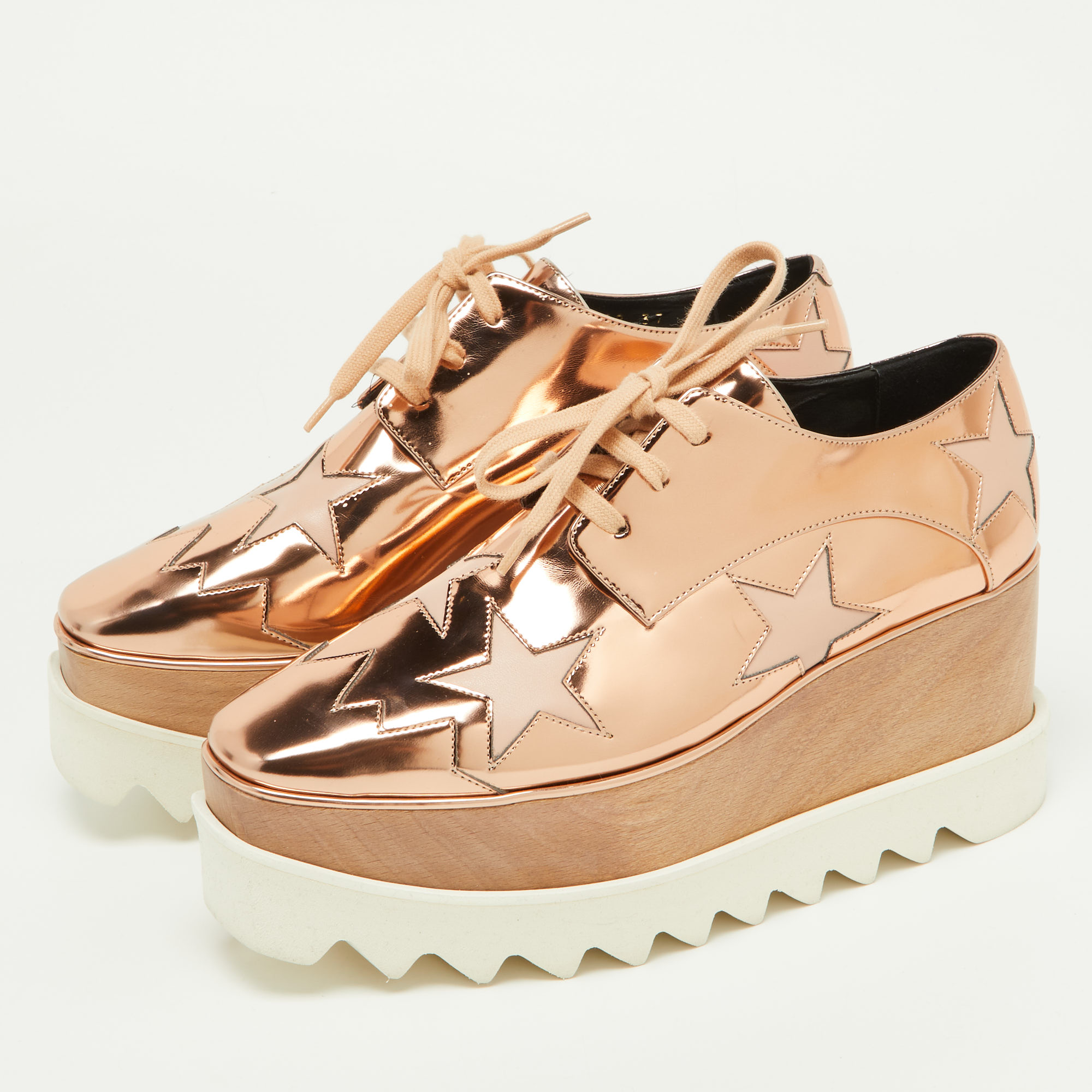 

Stella McCartney Metallic Rose Gold Faux Patent Leather Elyse Star Platform Lace Up Sneakers Size