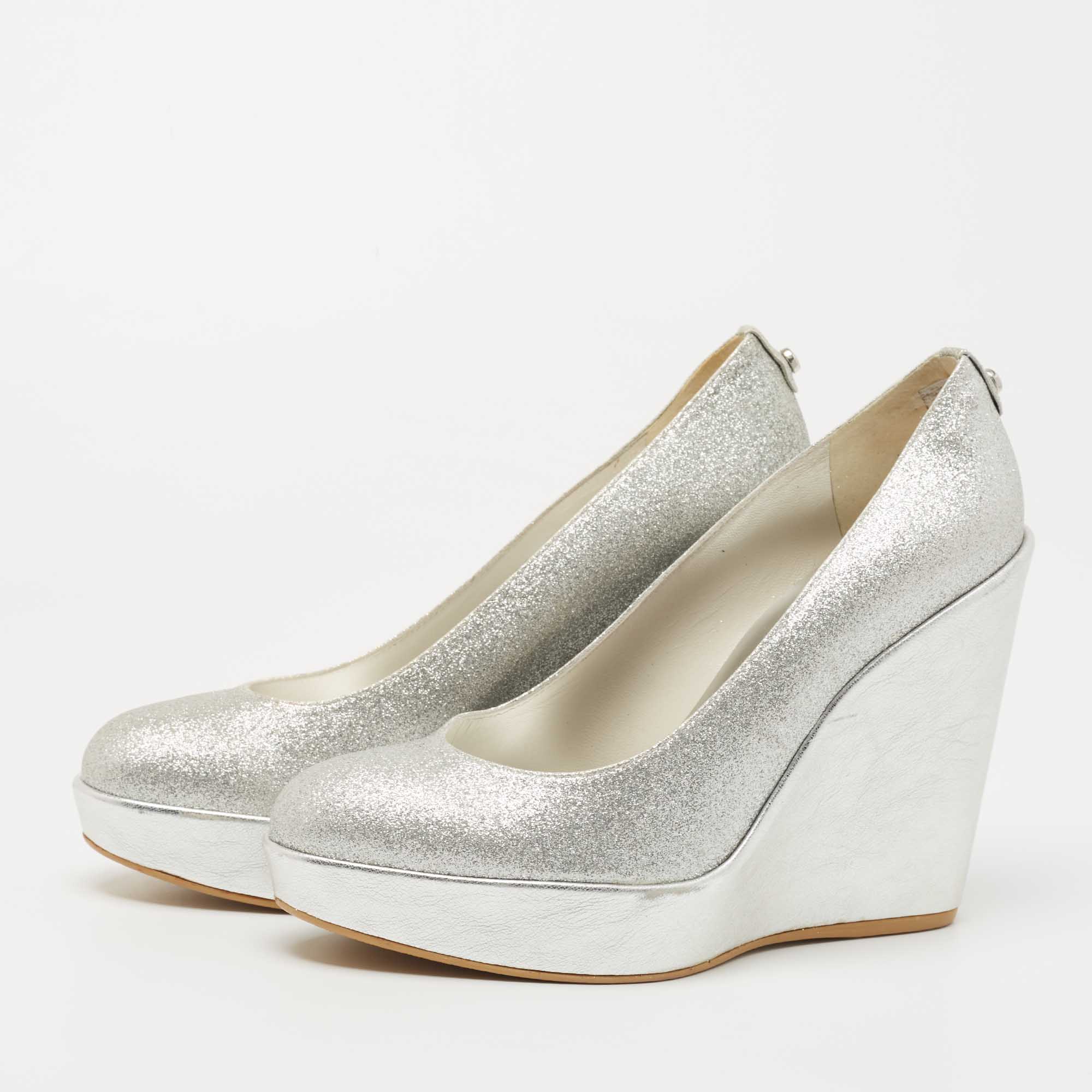 

Stuart Weitzman Silver Leather and Glitter Wedge Pumps Size