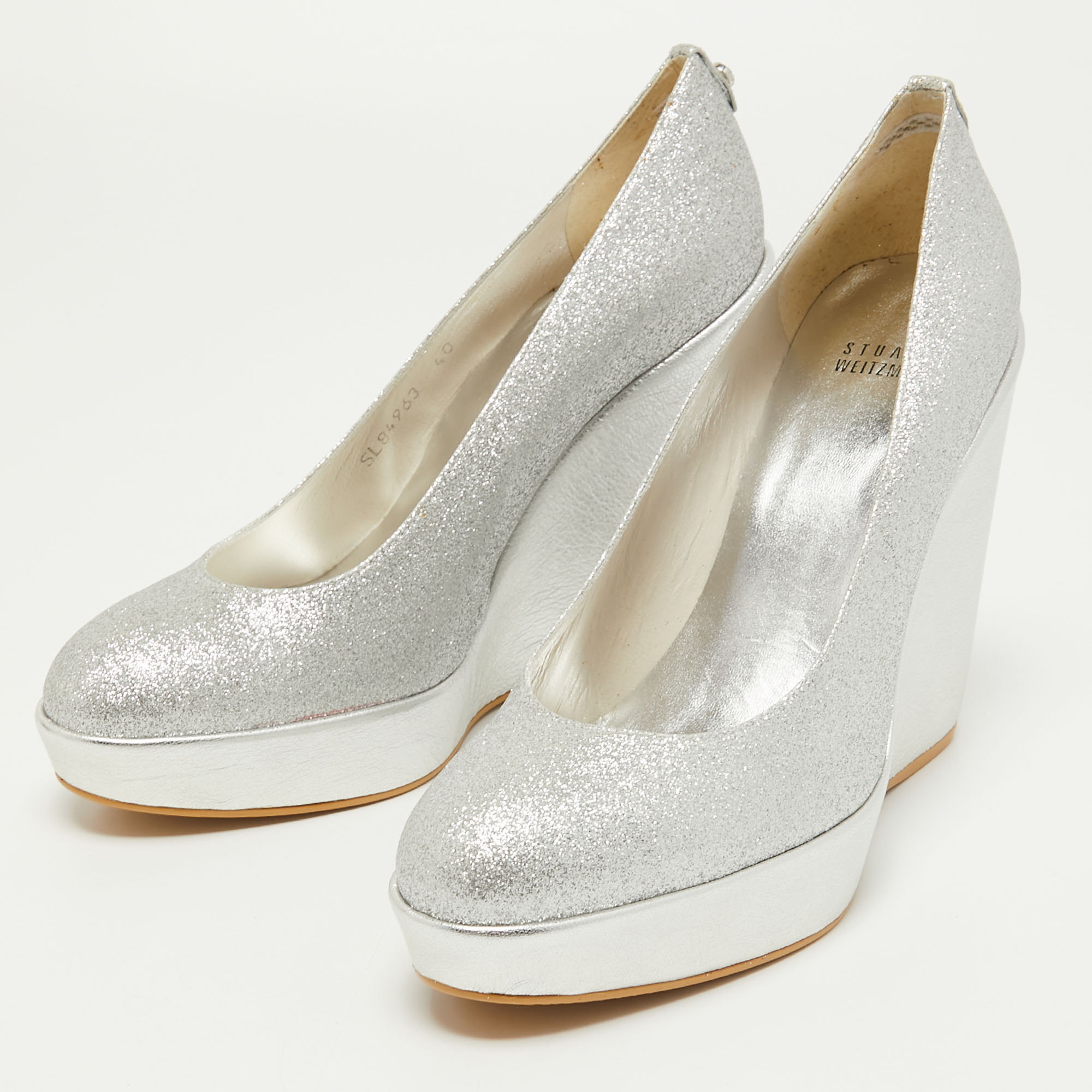 

Stuart Weitzman Silver Leather and Glitter Wedge Pumps Size