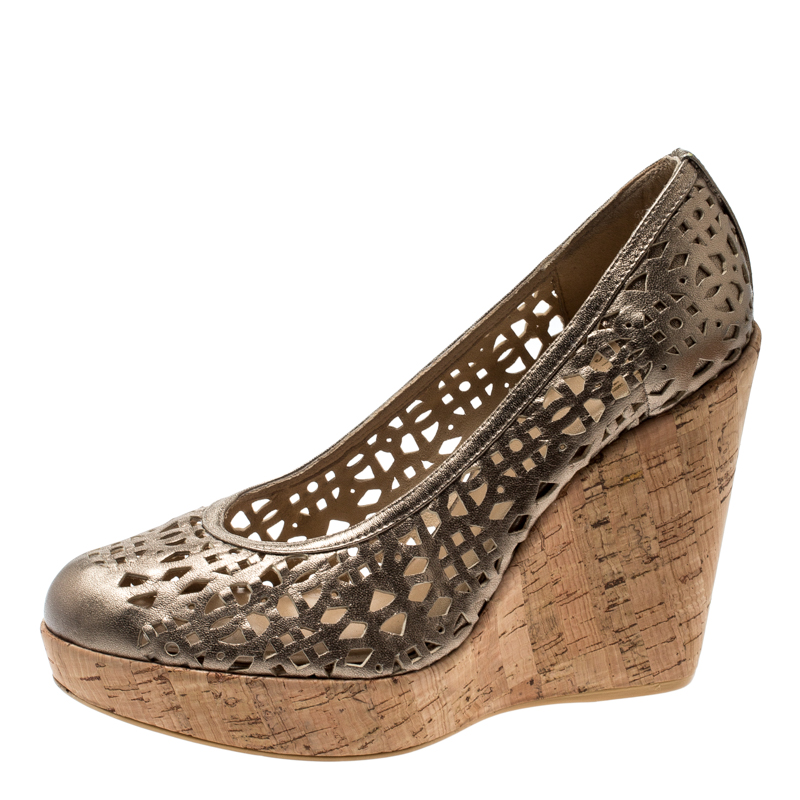 

Stuart Weitzman Metallic Gold Leather Nudotcomer Lazer Cut Cork Wedge Platform Pumps Size