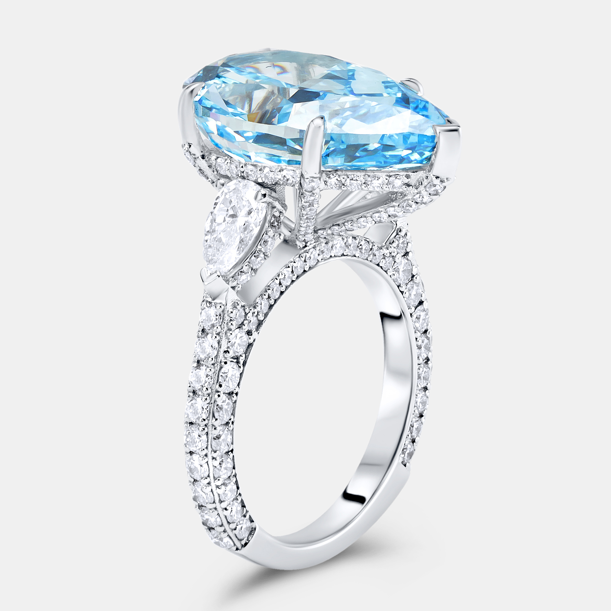 

13.3 cts Fancy Blue Pear Brilliant and Round 18k White Gold Ring Size