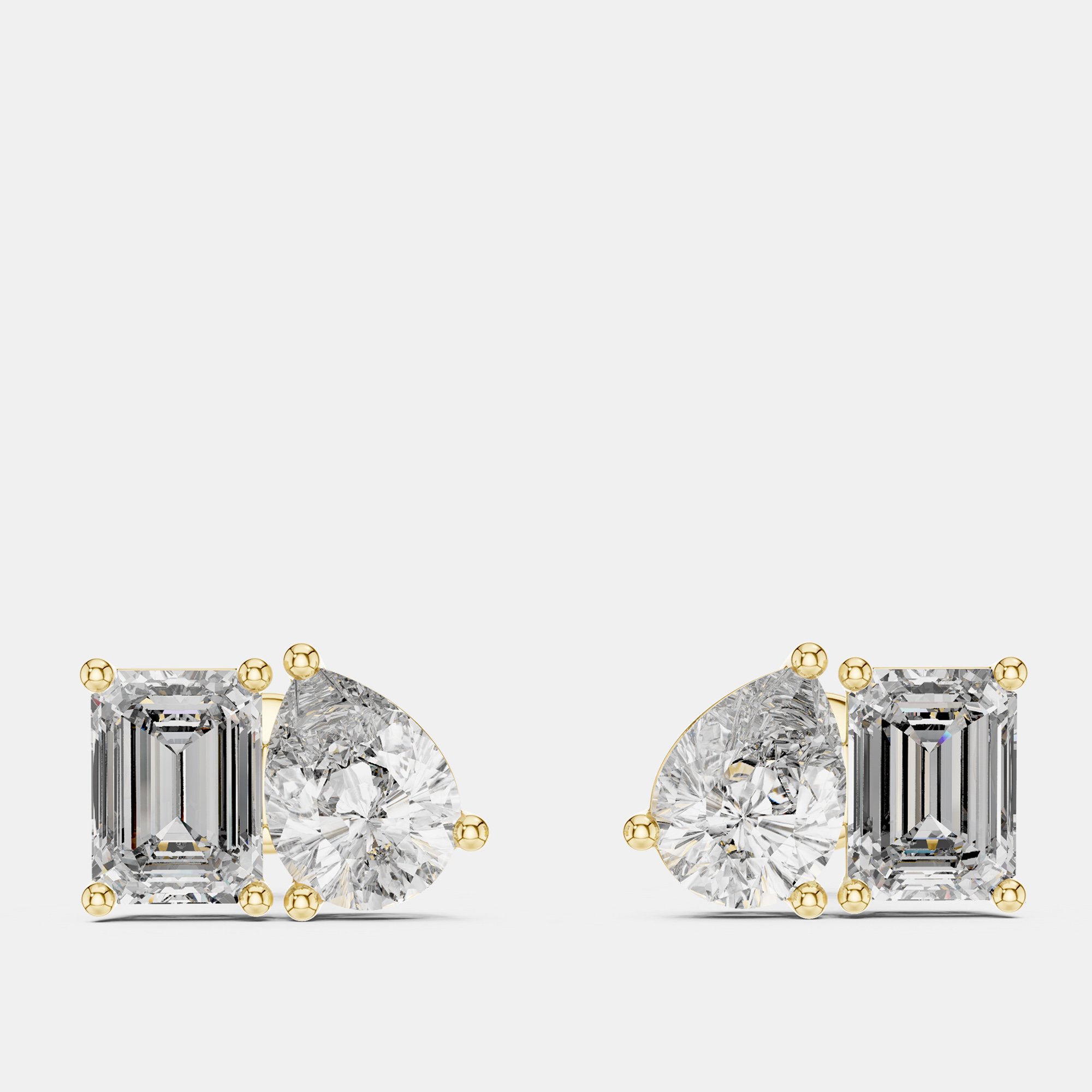 

2.00 cts Pear Cut and Emerald Cut 18k Yellow Gold Lab Grown Diamond Stud Earrings