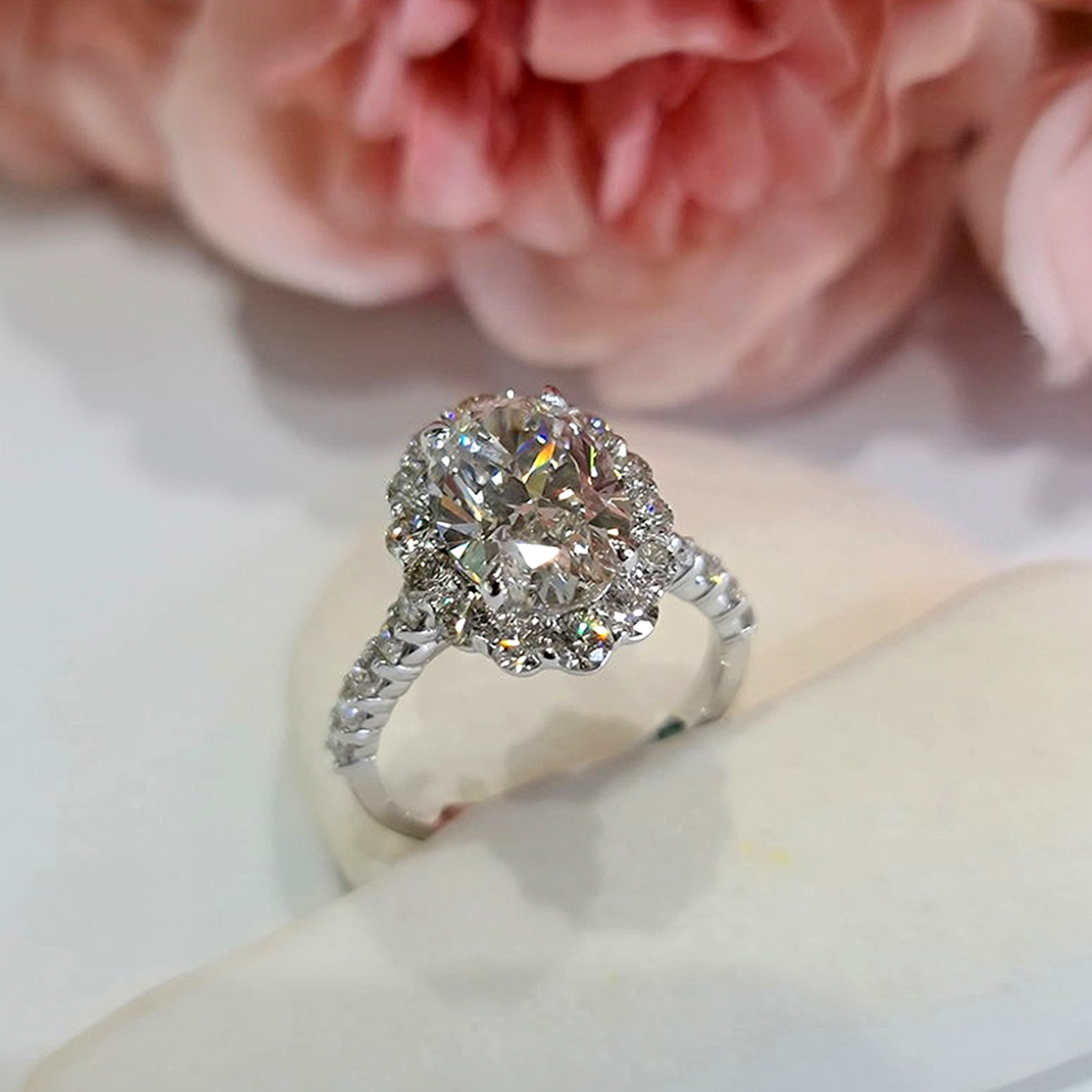 

4.38 cts Oval Lab Grown Diamond 18k White Gold Engagement Ring Size