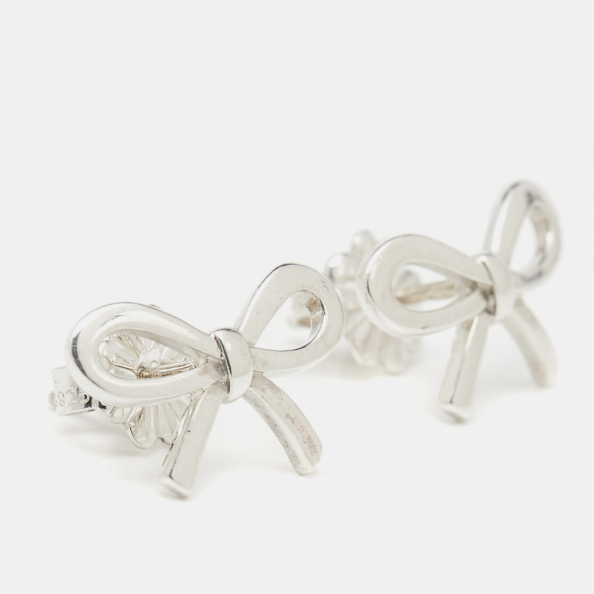 Tiffany & Co. Bow Sterling Silver Pendant Necklace And Earrings 