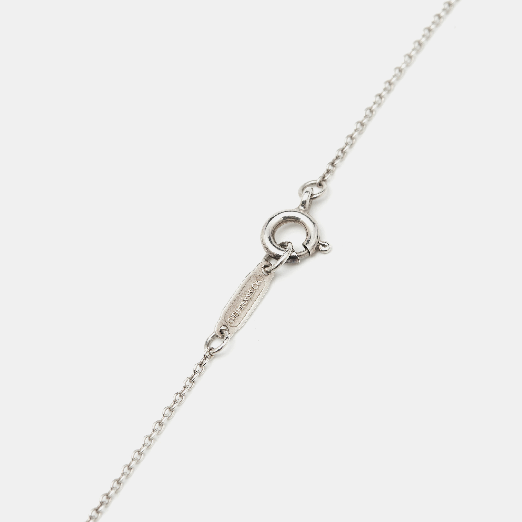 Tiffany & Co. Bow Sterling Silver Pendant Necklace And Earrings 