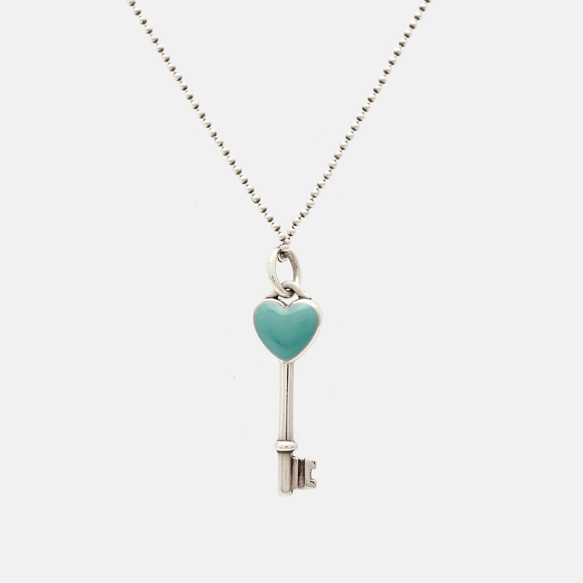 

Tiffany & Co. Heart Key Blue Enamel Sterling Silver Pendant Necklace