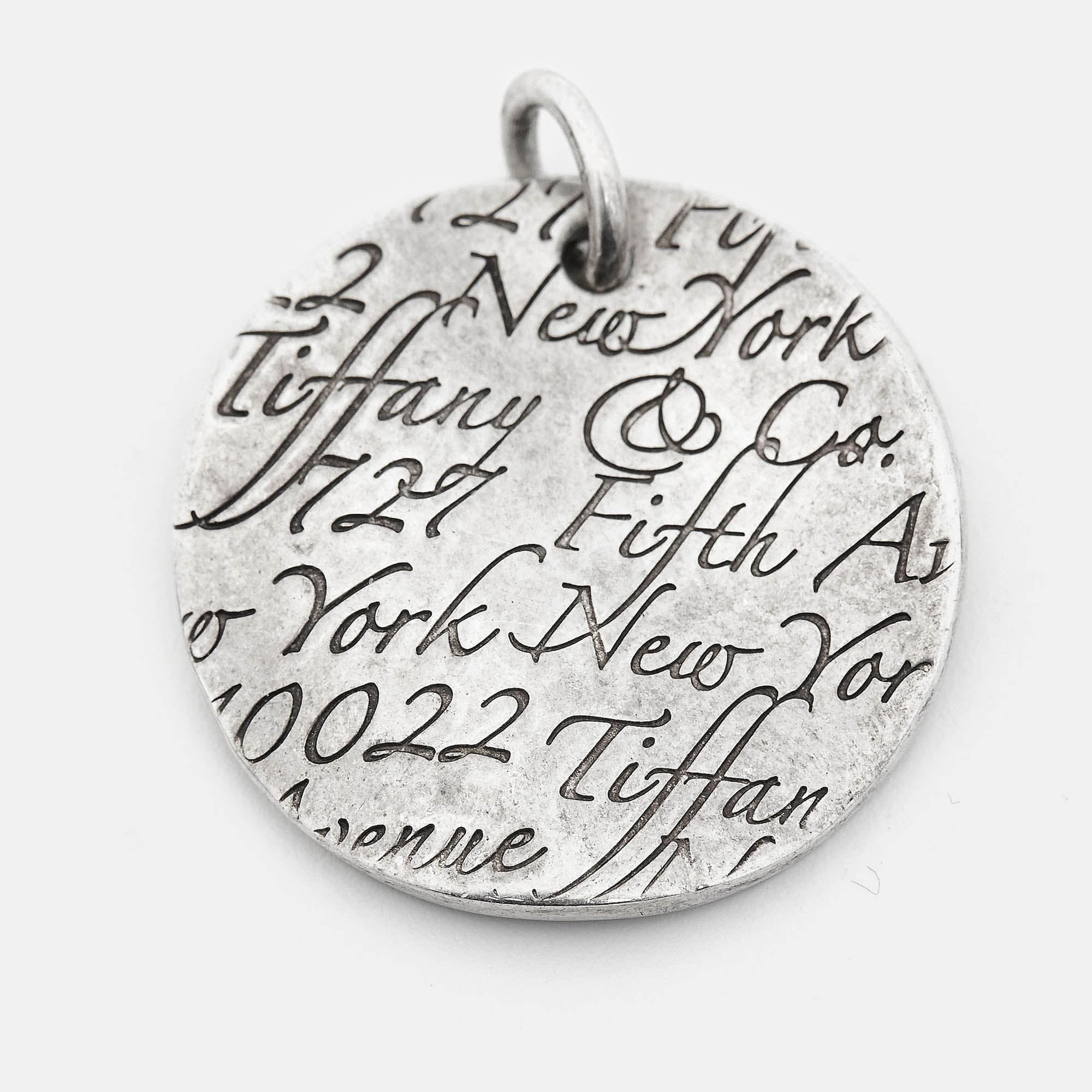 

Tiffany & Co. Tiffany Notes Wavy Round Sterling Silver Pendant