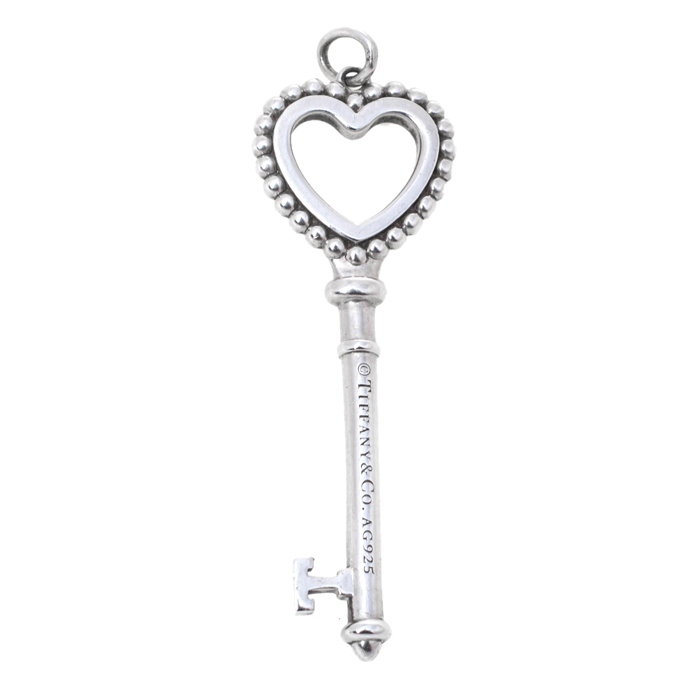 

Tiffany & Co. Enamel Beaded Heart Key Silver Pendant