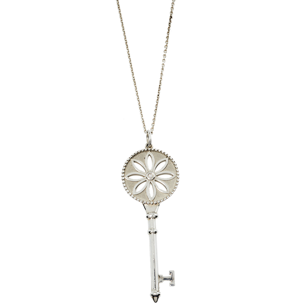 Click to view more detailed imagery on our partner's website Pre-owned Tiffany & Co Daisy Key Diamond Silver Long Pendant Necklace