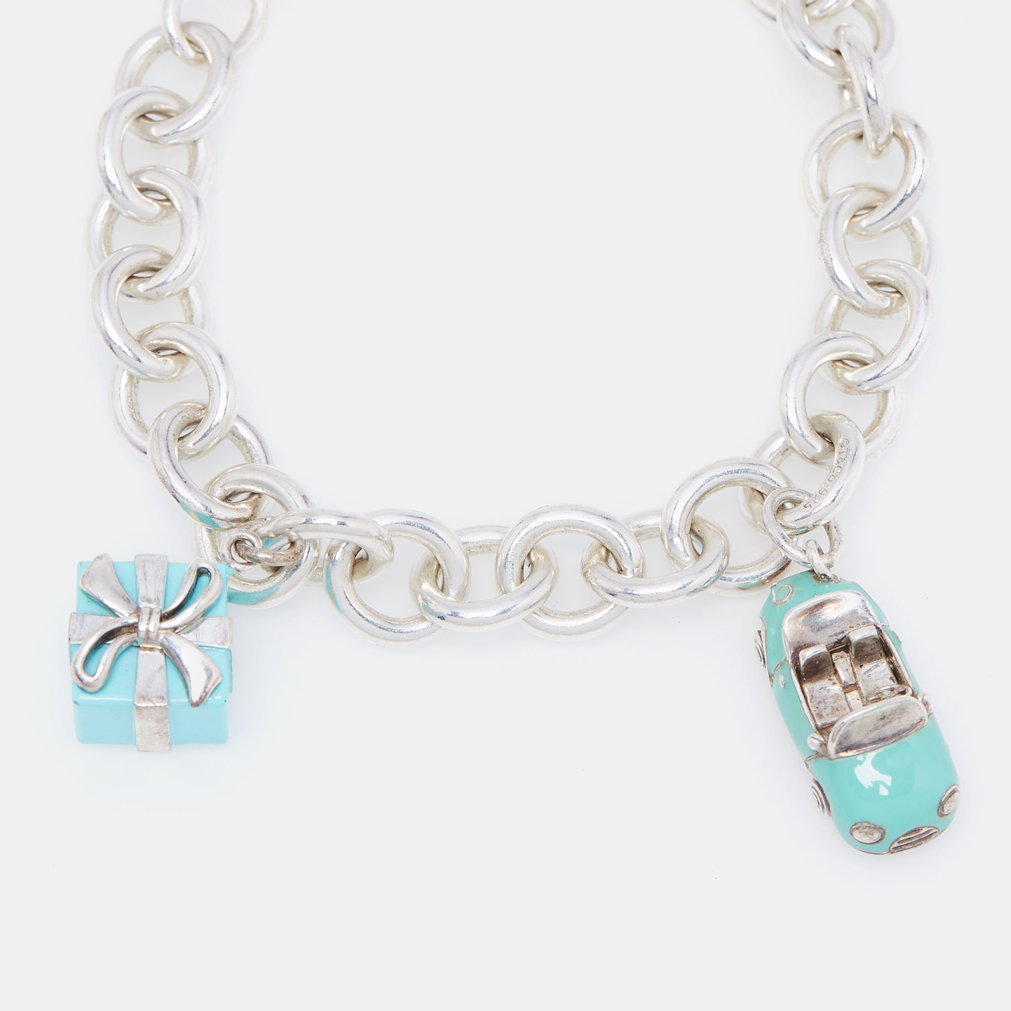 

Tiffany & Co. Return to Tiffany & Co. Multi Charm Enamel Sterling Silver Bracelet