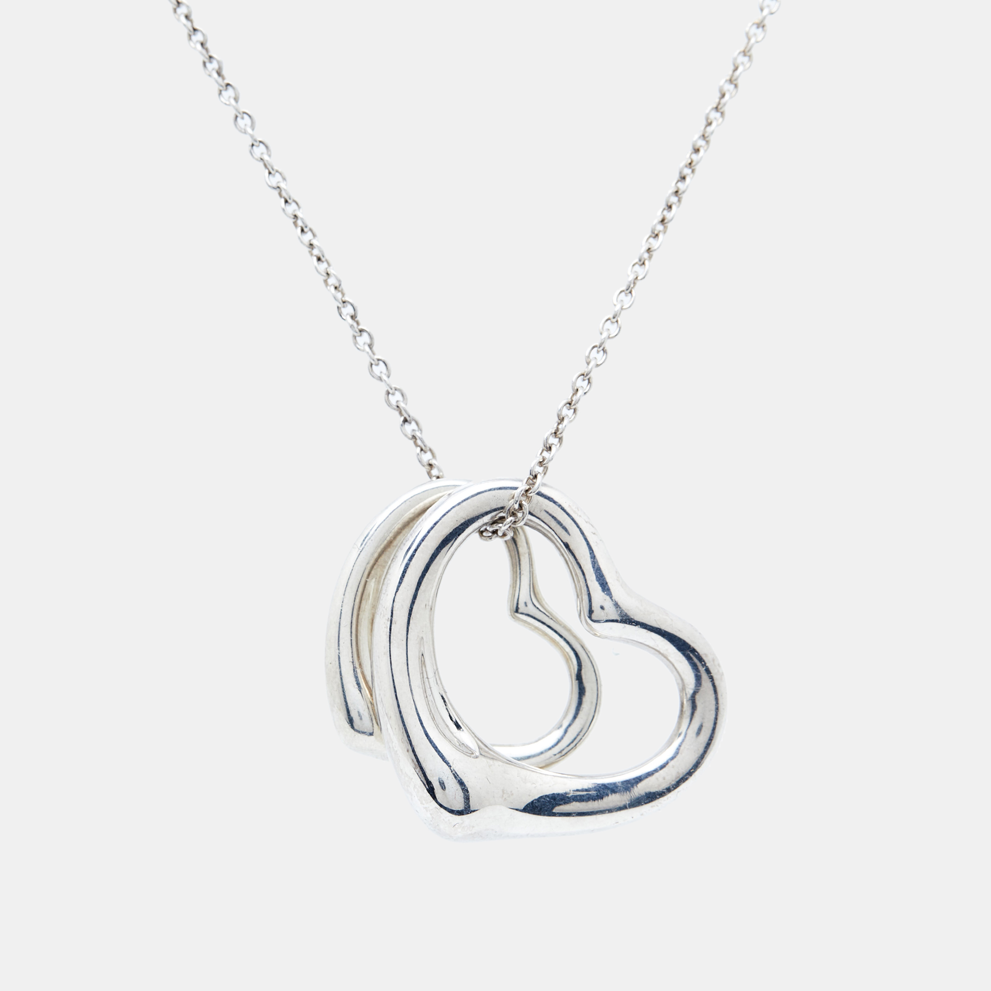 

Tiffany & Co. Elsa Peretti Double Open Heart Silver Pendant Necklace