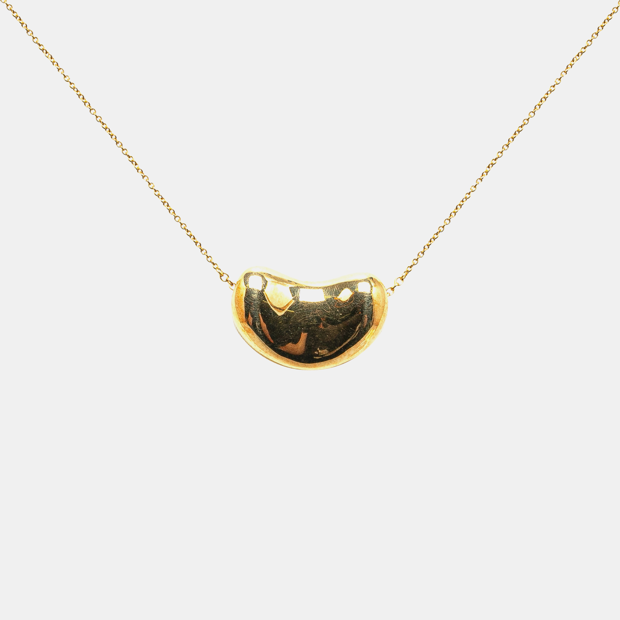 

Tiffany & Co. Elsa Peretti 18K Yellow Gold Bean Pendant Necklace