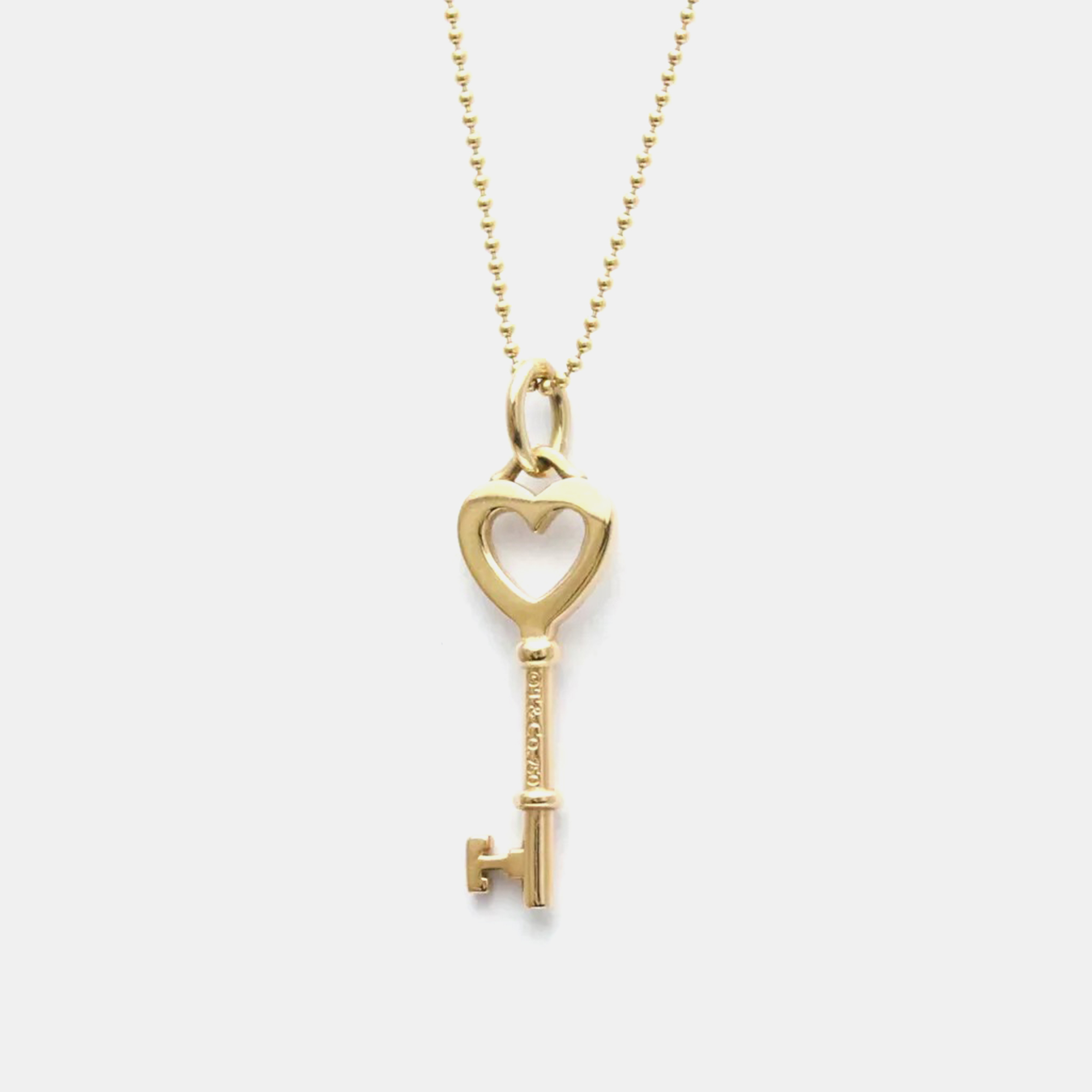 

Tiffany & Co. 18K Pink Gold No Stone Heart Key Pendant Necklace