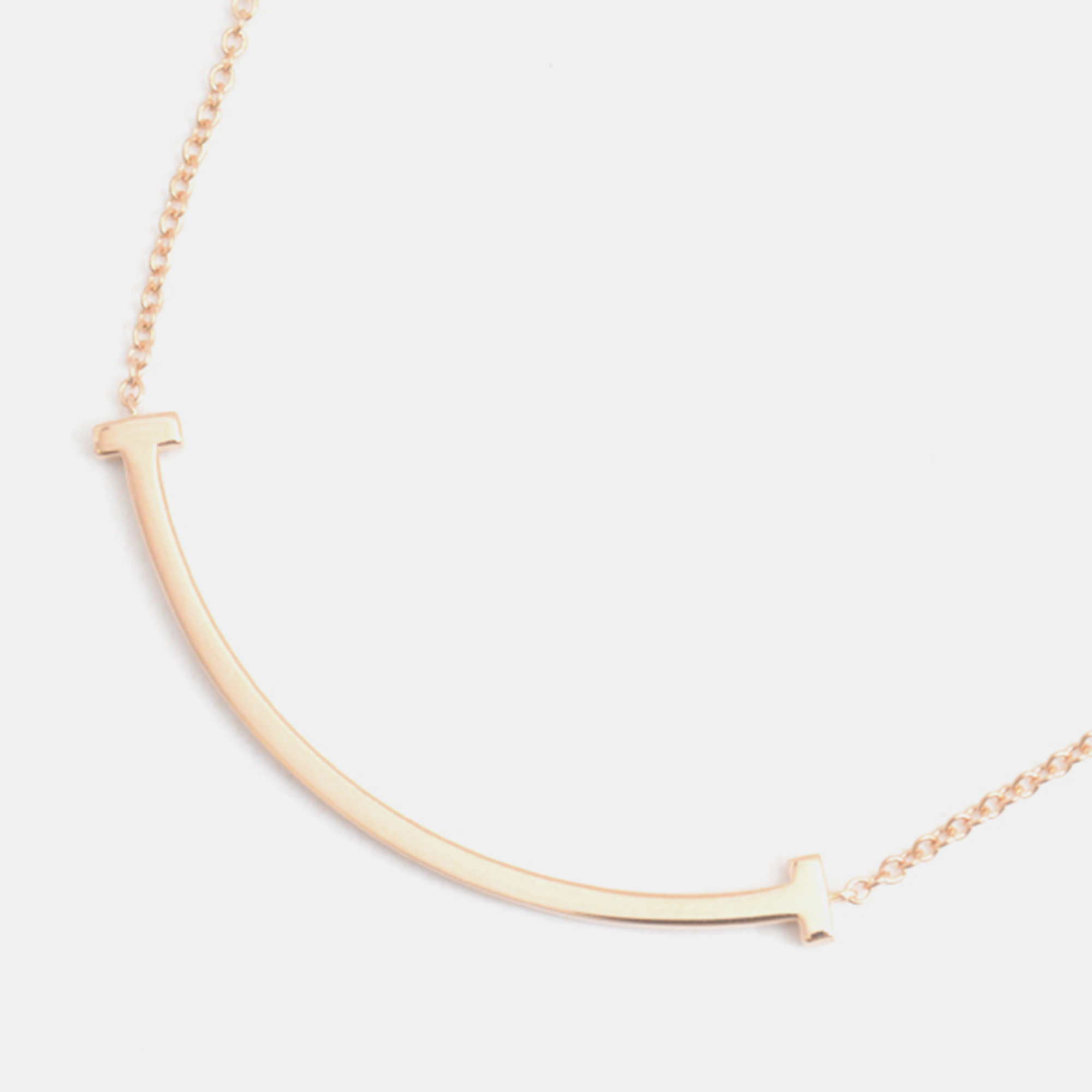 

Tiffany & Co. 18K Rose Gold and Diamond T Smile Pendant Necklace