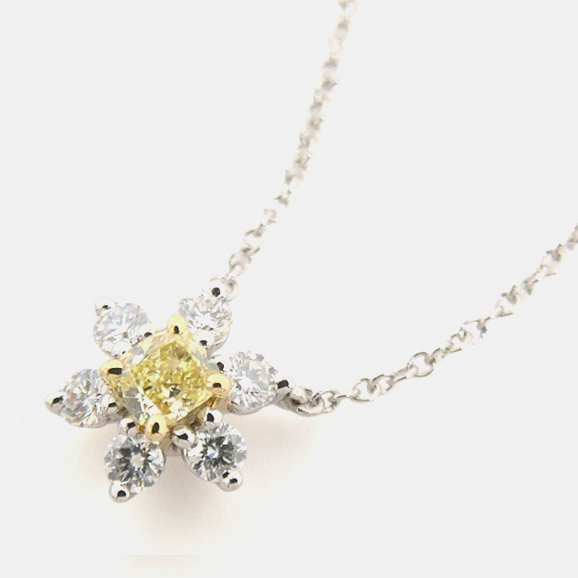 

Tiffany & Co. Platinum, Diamond and Yellow Sapphire Buttercup Pendant Necklace