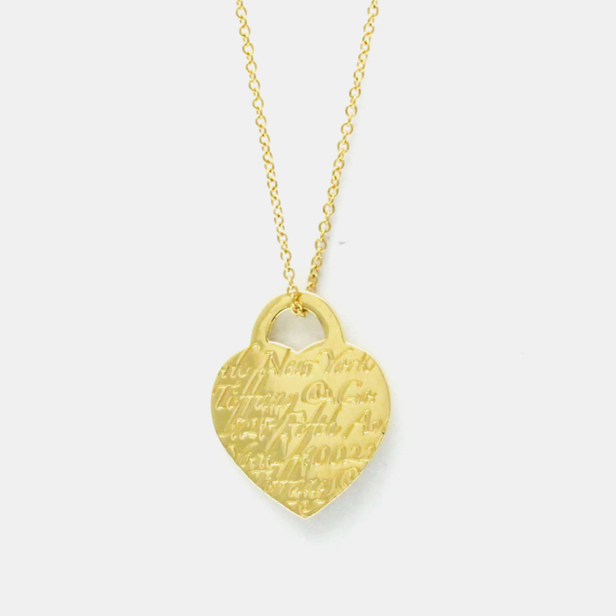 

Tiffany & Co. 18K Yellow Gold Notes Fifth Avenue Heart Tag Pendant Necklace